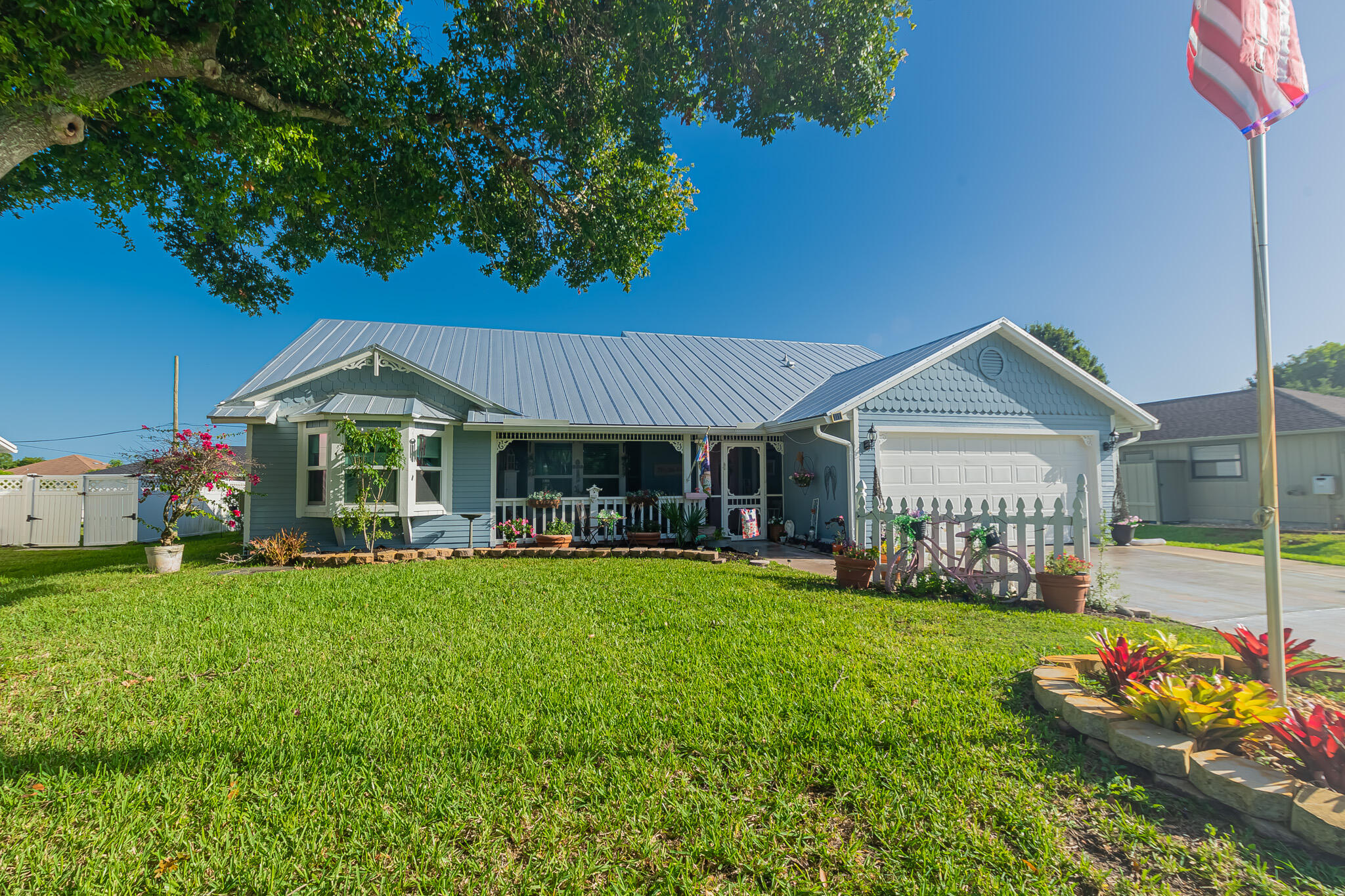 Charming French Country Elegance Meets Private Florida Oasis! Tucked away on a quiet street with quick access to Crosstown Pkwy, this light-filled 3BR/2BA/2GAR plus flex room pool home perfectly pairs classic style with modern comfort. Boasting a new metal roof (2022) and an airy split floor plan, the home flows effortlessly across distinct living, dining, and family areas. Kitchen has stainless appliances, quartz counters, breakfast nook, plenty of cabinetry. Enjoy ultimate versatility with a dedicated flex room—perfect for a home office. Outside, your private paradise awaits: a massive screened pool and an expansive covered lanai built for year-round entertaining. backyard shed.  Storm protection to include impact glass and accordian shutters across the covered lanai.