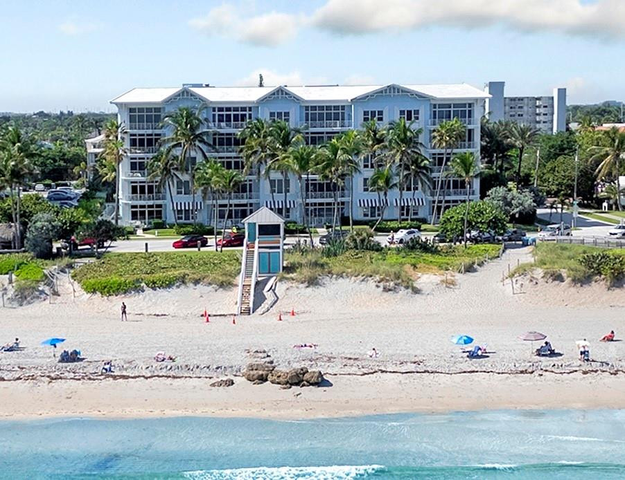 TOP VALUE OCEAN PENTHOUSE — REDUCED! Rare top-floor beachfront residence in a boutique building with soaring 11' ceilings, impact glass, and over $150K in recent upgrades. Bright open kitchen, living, and dining areas flow to a spacious balcony with ocean views, perfect for sunrise coffee or outdoor dining. Spacious primary suite offers a spa-style bath with skylight, dual sinks, and dual walk-in closets. Thoughtfully designed 3BR/3BA layout includes two flexible guest suites, and separate laundry room. SIRS completed with strong reserves for added buyer confidence. Amenities include pool, fitness center, beach access, and 2 garage spaces. Stroll to the boardwalk, dining, shopping, and pier. Experience the South Florida beachfront lifestyle year round or seasonal!