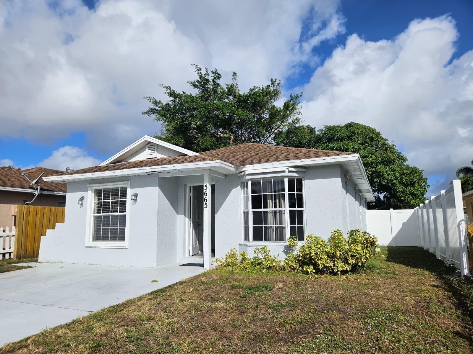 Don't miss this opportunity in Greater Boynton Place! This 3-bedroom, 2-bathroom single-family home features key recent updates including a new AC system (2025), updated tile flooring, and a newer privacy fence. Spacious fenced backyard, driveway with parking for 2 vehicles, low HOA dues, and no rental restrictions. Conveniently located minutes from shopping, dining, and I-95. Competitively priced and offered as-is for a smooth, quick closing. Easy to show.