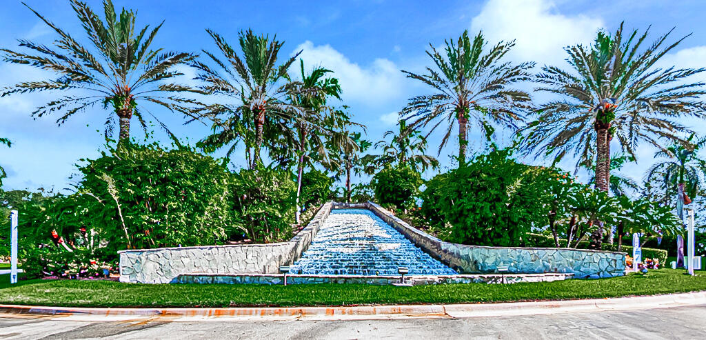 This immaculate coach home is the perfect place for full time, part time or vacation residents to enjoy. BRAND NEW ROOFS ON ALL THE BUILDINGS GIVES YOU PEACE OF MIND! A huge savings that you will never have to worry about. Assessment has been paid in full by the current owner. This coach home also comes equipped with hurricane impact windows and sliding doors. From your patio, living areas and primary bedroom you can enjoy lovely lake views. This home has been well maintained by its original owners who lightly used as a vacation home. The HOA fee includes water, ADT alarm system, home phone, PREMIUM cable channels, high speed internet, landscaping, pest control, exterior paint, maintenance and replacement of the roof, BUILDING INSURANCE! All you pay is contents insurance. Big savings! Enjoy resort style living in this 55+ community. 24-hour guard gated for extra security, lap pool, resistance pool, fun pool, jacuzzi, fitness center, yoga studio, crafts, cards, billiards, Bocce, pickleball, tennis, shuffleboard, ballroom with fantastic shows, library, movie room, clubs to join and so much more! This is the life you deserve. There is an 80/20 rule in place that allows buyers to be under 55 as long as no one under 19 resides in the home. The clubhouse will be undergoing a renovation and set to be completed 1st quarter 2027. It will be gorgeous and modern. There will be an assessment when the project is complete in the amount of $3646.00. It can either be paid in full or broken down to monthly payments of $41 over 10 years. Quite a value for a brand -new clubhouse!