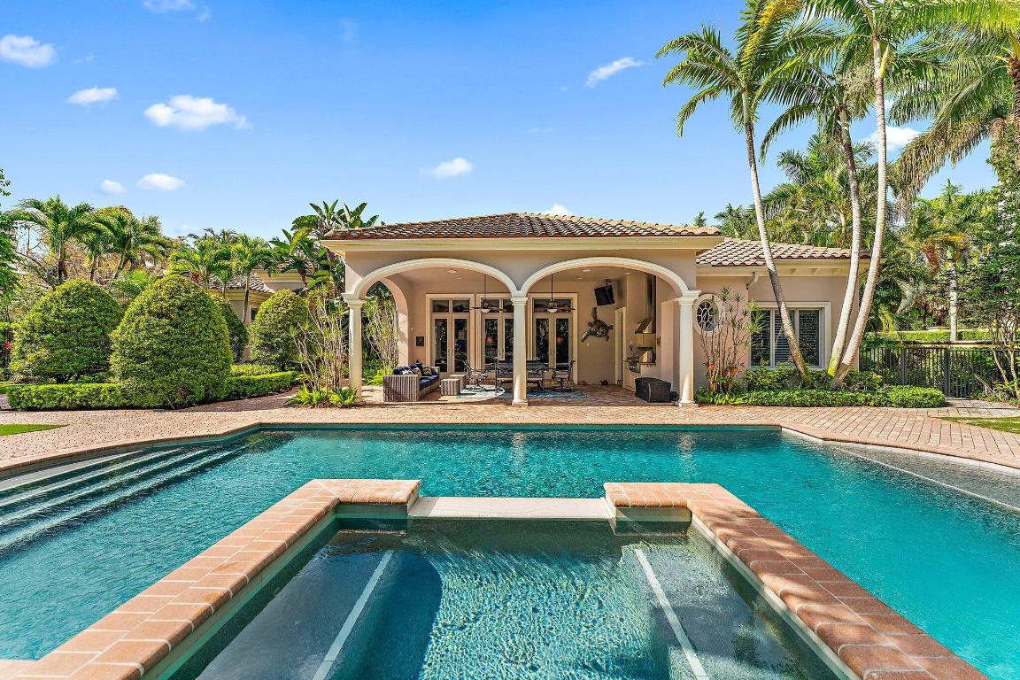 Stunning single owner home in prestigious Old Palm Country Club!  Located in the Grand Estates, the lot is a full half acre with a breathtaking pool & lanai, lavish millwork, full home generator, hurricane impact glass, 2020 roof, newer ac units, newly resurfaced pool with Jandy automation, 1 yr. old water heater, & a 3 car garage.  Gorgeous wrought iron french doors welcome you to a large foyer with volume ceilings and picture windows facing the lush outdoor space. The Castillo model boasts a split floor plan, coffered ceilings, walk in closets, 4 en-suite guest rooms plus office, chef's kitchen with Dacor appliances, marble floors, solid core doors, designer fixtures, and plantation shutters throughout.  As of 5/20/23 a new golf membership is available for purchase, but not mandatory.