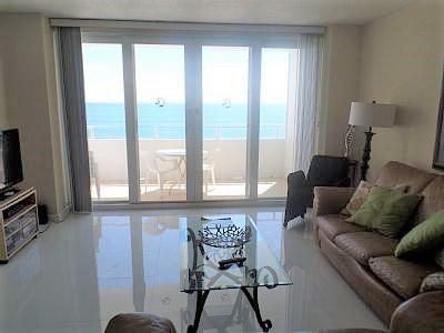 VERY RARELY 1 BEDROOM/1 BATH CONDO WITH DIRECT OCEAN VIEW AND DIRECT POOL VIEW FROM ALL THE ROOMS. LARGE BALCONY IN THE LIVING ROOM, FLOOR TO CEILING, WALL TO WALL WINDOWS IN THE BEDROOM OVERLOOKING THE POOL, N=BEACH AND OCEAN. IMPACT WINDOWS AND SLIDING GLASS TO BALCONY. NO RENTAL RESTRICTIONS WITH RECORDS OF HIGH INCOME VACATION RENTAL. RENOVATED WHITE KITCHEN CABINET WITH GRANITE COUNTER TOPS.WHITE CERAMIC TILES THROUGHOUT. ALL AMENITIES INCLUDED IN THIS RESORT LIKE CONDO. YOUR ONLY EXPENSES ARE HOA'S, REAL ESTATE TAXES AND ELECTRICITY.