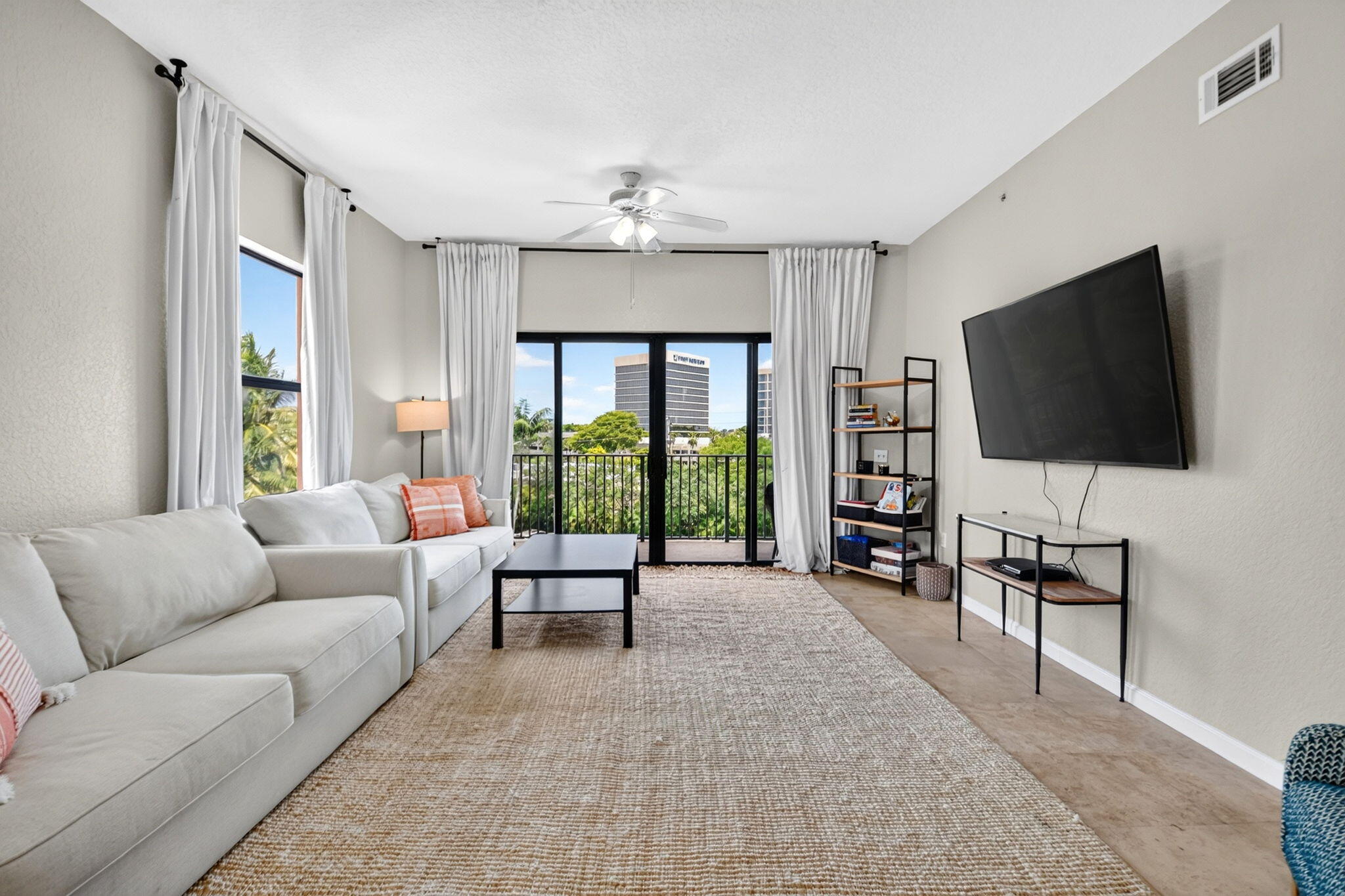 Rarely available. Perfectly positioned. This fourth-floor corner residence at Park Place delivers the space, light, and West Palm Beach location buyers want. Extra corner windows and soaring 10-foot ceilings flood the residence with natural light, while fresh designer paint, new lighting, and Saturnia marble floors give the open living and dining areas a polished finish. The eat-in kitchen features granite countertops, stainless steel appliances, 42-inch cherrywood cabinetry, and abundant storage.   The split 2-bedroom, 2-bath floor plan creates privacy where it matters. The primary suite offers dual mirrored closets, a jetted garden tub, separate shower, and generous cabinetry. A covered private balcony, newer washer and dryer, Nest thermostat, two assigned parking spaces, and close access to the elevator and stairwell complete the residence.  Park Place offers gated entry, building security, on-site management, pool, fitness center, sauna, billiards, and community room. Walk to Whole Foods, Palm Beach Outlets, shopping, dining, and everyday conveniences. Downtown West Palm Beach, Brightline, Palm Beach Island, beaches, PBI Airport, and I-95 are minutes away.  Big space. Corner light. Unbeatable access. This is the one to see. Pets up to 30 lbs are permitted.