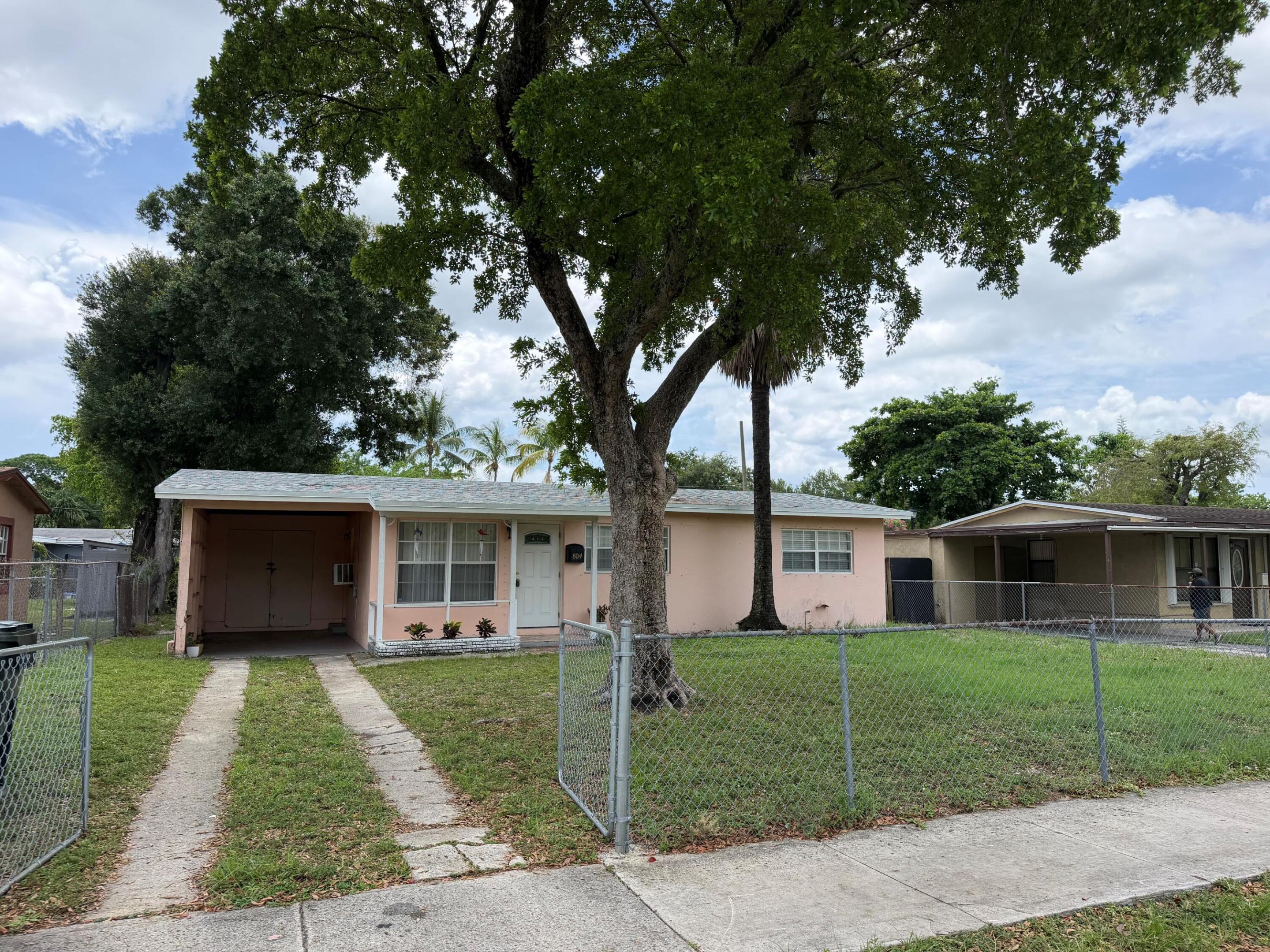Beautiful 2/1 with carport - shed - with w/d hookups - two fenced in yards - tiled through out - -priced right for quick sale - truly a must see................