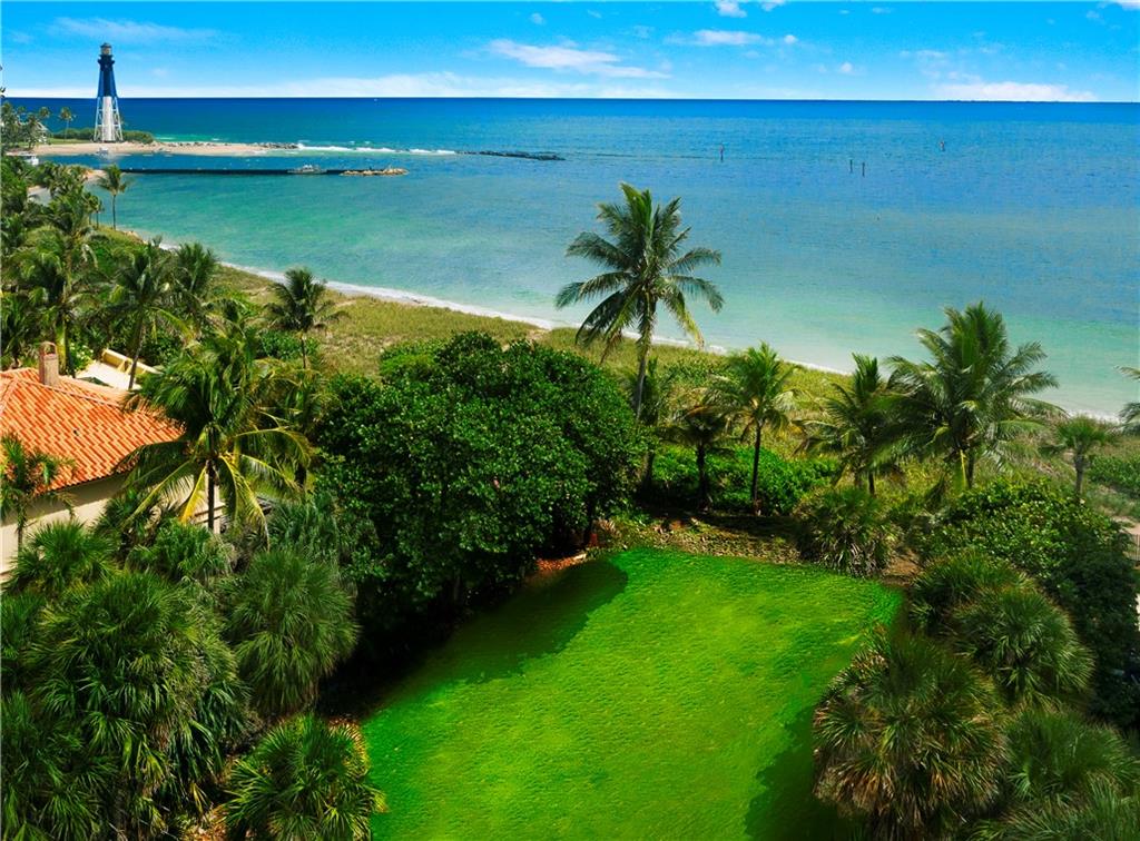 Looking for the perfect oceanfront site to develop?  Hillsboro Shores offers a rare & idyllic opportunity to build your ultimate beach house. This incredible 17,474 square foot lot is perfectly situated directly on the sand.  The views are superior extending over to the Lighthouse & offer a daily boat parade from the Hillsboro Inlet.  The community itself is a hidden secret tucked away off A1A. The beach is mainly visited by local residents who are association members with card access. There is no public car parking or right of way at this end of the beach. The dimensions of the lot are 85 ft (street) x 234 ft x 227 ft x 67 ft (oceanfront).  The dunes & sea grapes add privacy & protection to the residence. Purchase now as demand for vacant sites & new construction on the beaches increases!