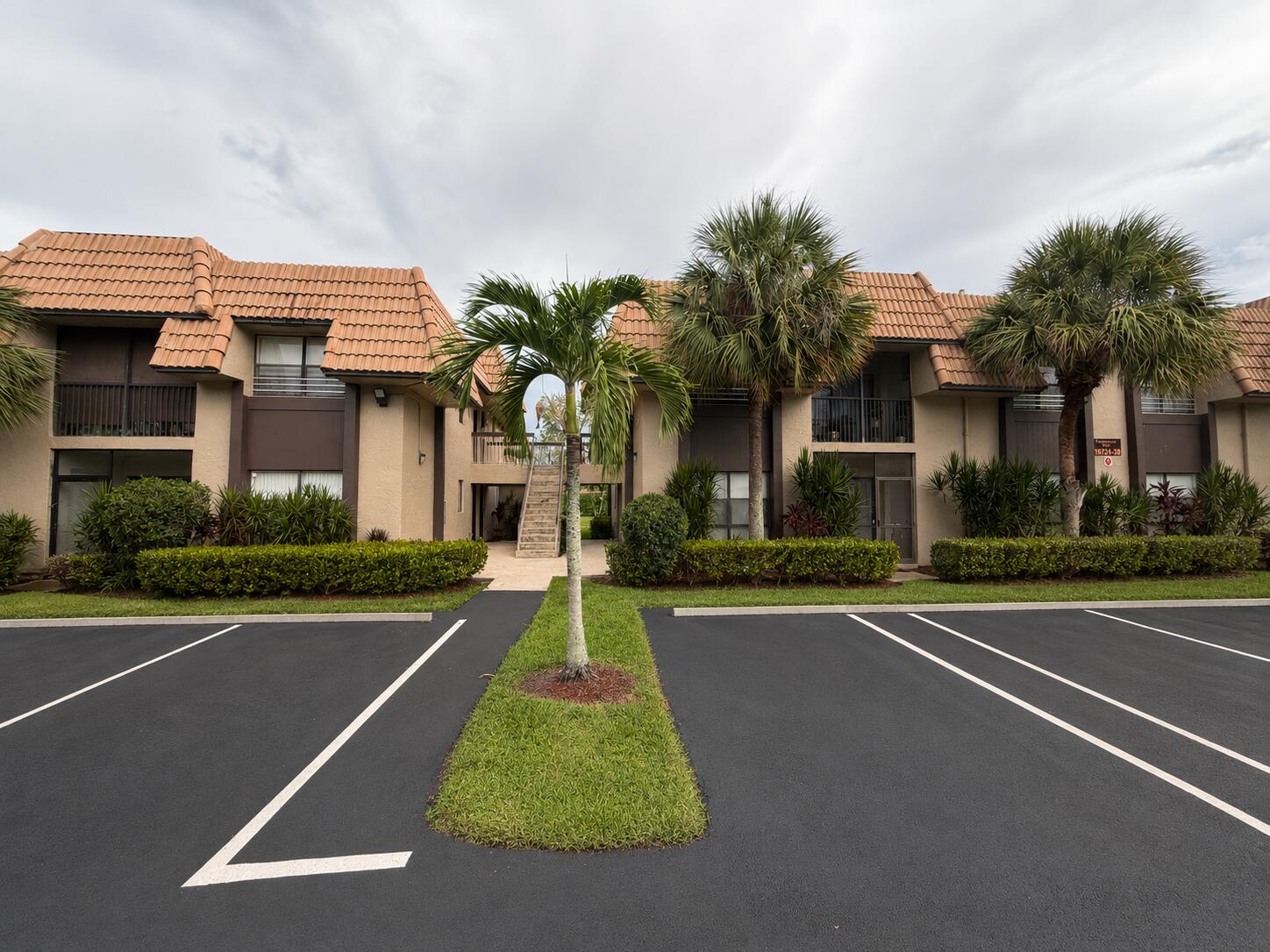 LEADING YOU HOME! recent upgrades  and Serene water views with pride of ownership. Immaculately kept ground floor unit; charming two-bedrooms, two-bathrooms condominium nestled in Grenadier East Condo in Coral Springs is a desirable first floor dream. This single-story residence offers 892 square feet of finished living space, thoughtfully designed to maximize comfort and convenience. Home provides a distinctive setting that enhances daily living with water views and the appeal of waterfront living. The two full bathrooms ensure comfortable accommodations for residents and guests alike. This condo presents an excellent opportunity for those seeking a well-proportioned waterfront residence in an established Coral Springs community. Basic cable and water is included in reasonable HOA dues.