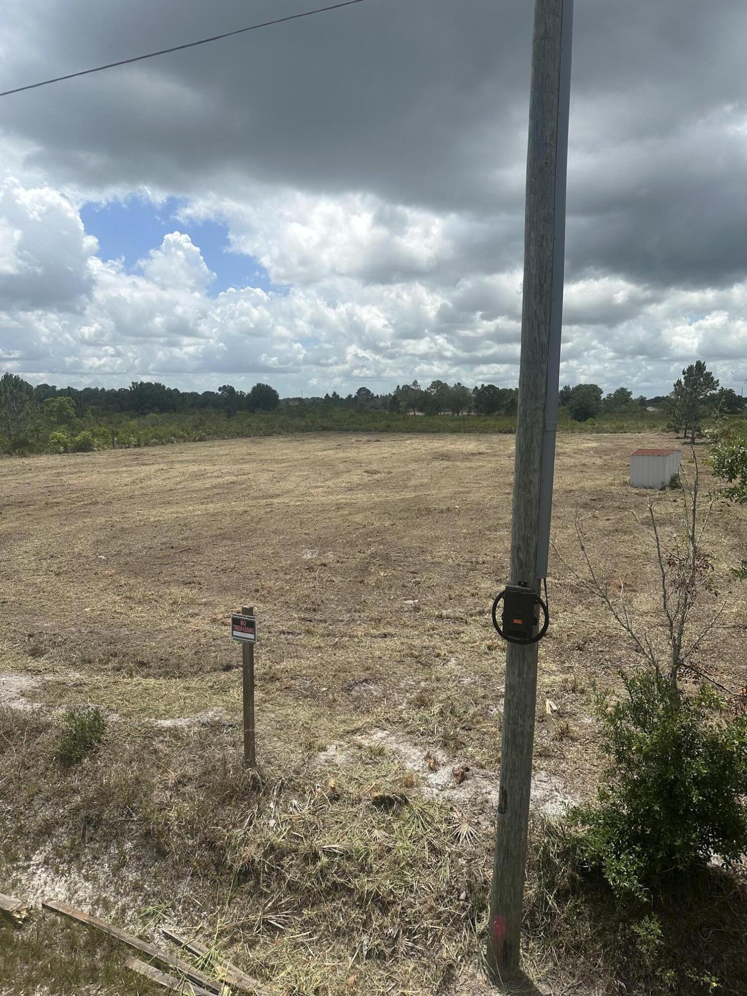 Build your future on this beautiful 1.25-acre property in Okeechobee. This mostly high-and-dry parcel has already been partially improved and is ready for your vision. The land is cleared and surveyed offering a clean slate for a new home, manufactured home, weekend retreat, or investment opportunity. A culvert is already in place for easy access, and electrical power is available at the street, helping simplify the building process. Enjoy the privacy, open space, and peaceful surroundings while still being conveniently located near town, shopping, dining, and outdoor recreation. Whether you are looking to build now or invest for the future, this property offers endless potential in a growing area.