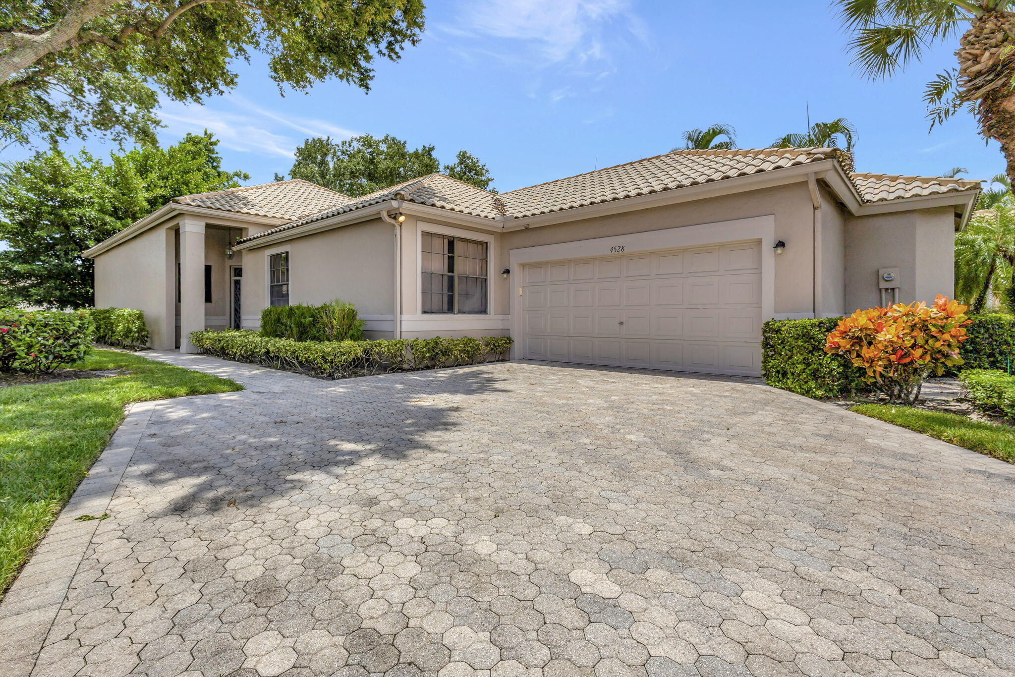 Take advantage of the season and enjoy this light-filled corner lot home with a Silver (non-golf) Equity Membership available. This 2-bedroom plus den, 2-bathroom home features a large yard with a covered & screened enclosed patio. Inside, you'll find immaculate tile floors throughout, recessed lighting, and a neutral color palette. The open layout seamlessly connects the great room and master suite to a covered, screened patio—perfect for relaxing or entertaining. Don't miss your chance to experience the exceptional amenities of Wycliffe Golf & Country Club this winter season. Wycliffe Golf & Country Club Is a mandatory membership community, with one of the best lifestyles In South Florida. Showcasing two newly renovated challenging 18 hole championship golf courses, with contrasting styles. No golf available with this rental. There are 14 Har-Tru tennis courts, with center court Stadium seating. The sports court features 8 pickle ball courts, plus 4 Bocce courts. Private dining room "Flavours" surpasses the highest expectation. The "Watermark", dining room continues to have great parties and entertainment, and who doesn't love our "Grill" for breakfast, lunch and dinner. Wait until you see "The Cliff". This lobby bar and lounge is the highlight of the recent renovation. In addition, we love our state-of-the-art fitness center, with Pilates studio and classes, aerobics, yoga, spin, water aerobics, personal trainers and more fitness classes than a person could take in a day. Thyre is our full-service spa, offering retail products along with fine services. Enjoy the sauna, steam, and Olympic Size Swimming pool. Wycliffe offers Ladies and Men's card rooms, clubs and organizations for every interest. Fabulous programs and special events, lots of dinner dances, trivia nights, shows and activities. When needed we even have physical therapy on campus. Best of all we are located just minutes from the International Polo and Dressage and Jumping events, at the Wellington Equestrian Center. Centrally located, Wycliffe has easy access to Boca Raton, Delray Beach, Palm Beach, City Place and the West Palm Beach airport.  Wycliffe homeowners association provides Comcast high speed internet, telephone and cable TV to contain the X1 platform with whole-house DVR, High Definition and 3 additional HD boxes which cover up to 4 TVs with voice activated remotes, including HBO and Showtime. The high speed internet service of 150 mbps speed and telephone service, local and long distance calling, included in the HOA. All landscaping maintenance, sprinkler systems, exterior painting, pressure cleaning the roofs, and security is included in the quarterly HOA maintenance fee. Wycliffe has roving guards, paramedics on campus, monitored alarm systems, and manned gates.