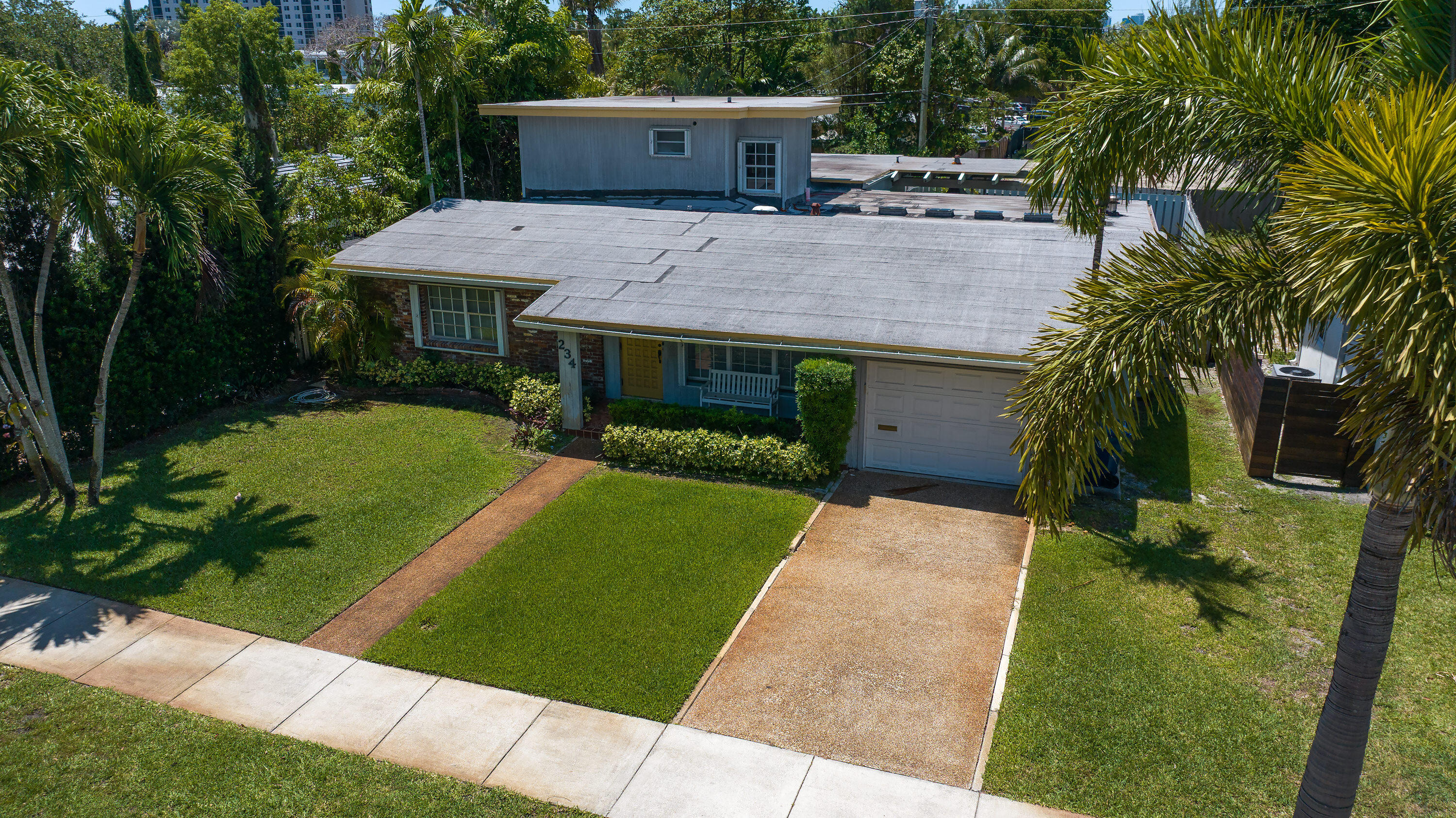 Luxury renovation or redevelopment opportunity on one of the last remaining custom homesites in Wilton Manors. Situated on one of the city's most coveted streets, known for its concentration of custom-built homes, this prime 125' x 135' lot offers the ideal blank canvas for a bespoke residence just moments from Wilton Drive & the Island City lifestyle. Enjoy easy access to Las Olas, waterfront dining, parks, world-class beaches, Miami, and the Palm Beaches. A rare rehab opportunity features a unique 70' x 15' platted alley currently rear lot garage access. The generous width and expanded separation provide greater design flexibility than typical lots. Park your RV or big boat trailer (buyer to verify use) Ideal for an owner-builder or savvy spec builder seeking a differentiated product. INVESTOR /REHAB SPECIAL Existing original home is occupied **DRIVE BY ONLY DO NOT WALK PROPERTY** - RECENT SURVEY AVAILABLE. "DO NOT ENTER" No warranties on improvements"