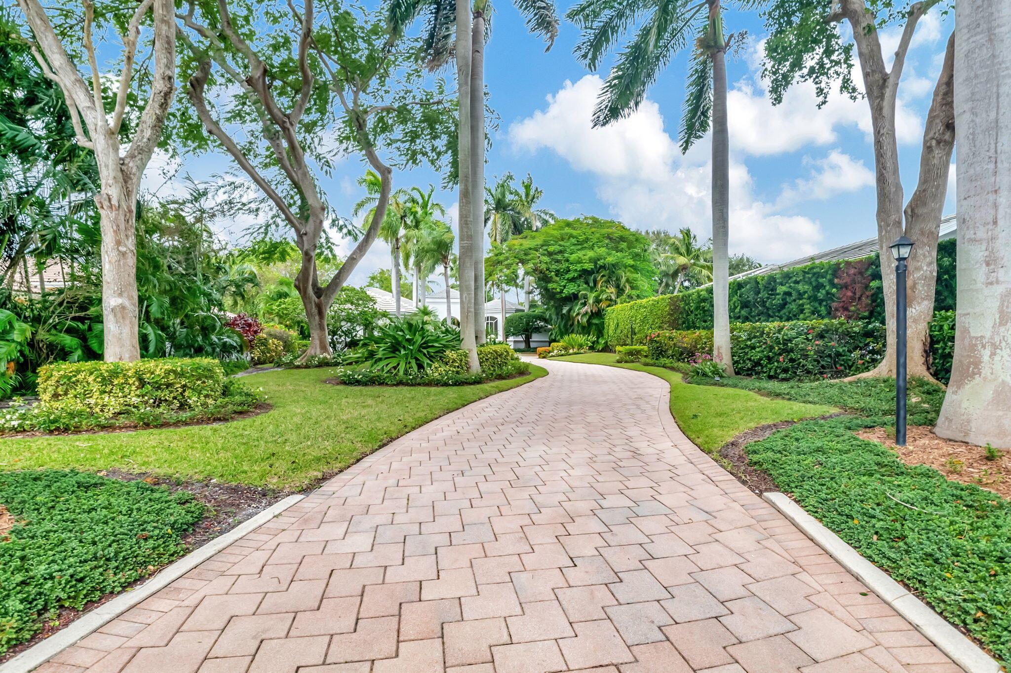 This luxurious courtyard home in The Sanctuary exudes sophistication and contemporary elegance, perfectly tailored for homeowners who value both comfort and style. Designed with meticulous attention to detail, the property features a main residence with 4 spacious bedrooms and 4 modern bathrooms, plus a stylish guest house for additional privacy and entertainment options.

Upon arrival, you're greeted by a long, estate-like driveway, bordered by lush landscaping that offers a sense of seclusion and grandeur. The drive leads to a 4-car garage, ideal for car enthusiasts or those with a passion for hosting gatherings. 

The courtyard layout is the heart of this home, blending indoor and outdoor living effortlessly. Centered around a tranquil pool, the courtyard provides a serene, private space for relaxation and entertaining. Floor-to-ceiling windows fill the living spaces with natural light, enhancing the seamless flow between rooms and offering stunning views of the outdoor oasis.

Professionally decorated, the home reflects a sleek yet timeless design, combining mid-century modern elements with high-end contemporary touches that appeal to the tastes of Generation X. The open-concept kitchen is a chef's dream, boasting custom cabinetry, high-end stainless steel appliances, and a massive island that serves as both a functional workspace and a social hub. Adjacent to the kitchen, the expansive living and dining areas offer plenty of room for entertaining, with sophisticated décor and high-end finishes throughout.

The master suite is a luxurious retreat, featuring a spacious bedroom, a spa-like en-suite bathroom with dual vanities, a soaking tub, and a walk-in shower, along with custom-designed closets. The additional bedrooms are generously sized, each offering comfort and privacy, with en-suite or adjacent bathrooms featuring top-tier materials and modern amenities.

Outdoors, the courtyard pool area is perfect for both intimate family time and hosting gatherings, with a built-in barbecue and ample seating areas. The guest house offers guests or extended family their own private space, complete with its own living area, bedroom, and bathroom, allowing for maximum comfort and independence.

With its blend of luxury, thoughtful design, and Generation X-friendly touches like energy-efficient features, and entertainment-focused spaces, this Sanctuary estate offers an ideal balance of form, function, and comfort.