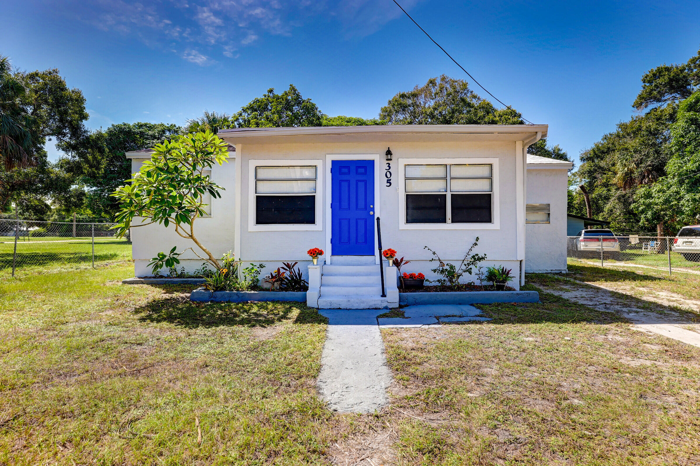 Check out this 3 BED 1 BATH home on a HUGE lot in Fort Pierce! 2023 ROOF! Fully updated kitchen with new cabinets, stainless steel appliances, quartz countertops and tiled backsplash. Newer LVP vinyl flooring throughout. Updated light fixtures. Freshly painted and professionally cleaned inside. Inside laundry room. Oversized fenced lot. No HOA restrictions. Minutes away from downtown Fort Pierce, beaches, restaurants, and entertainment. Schedule your private tour today!
