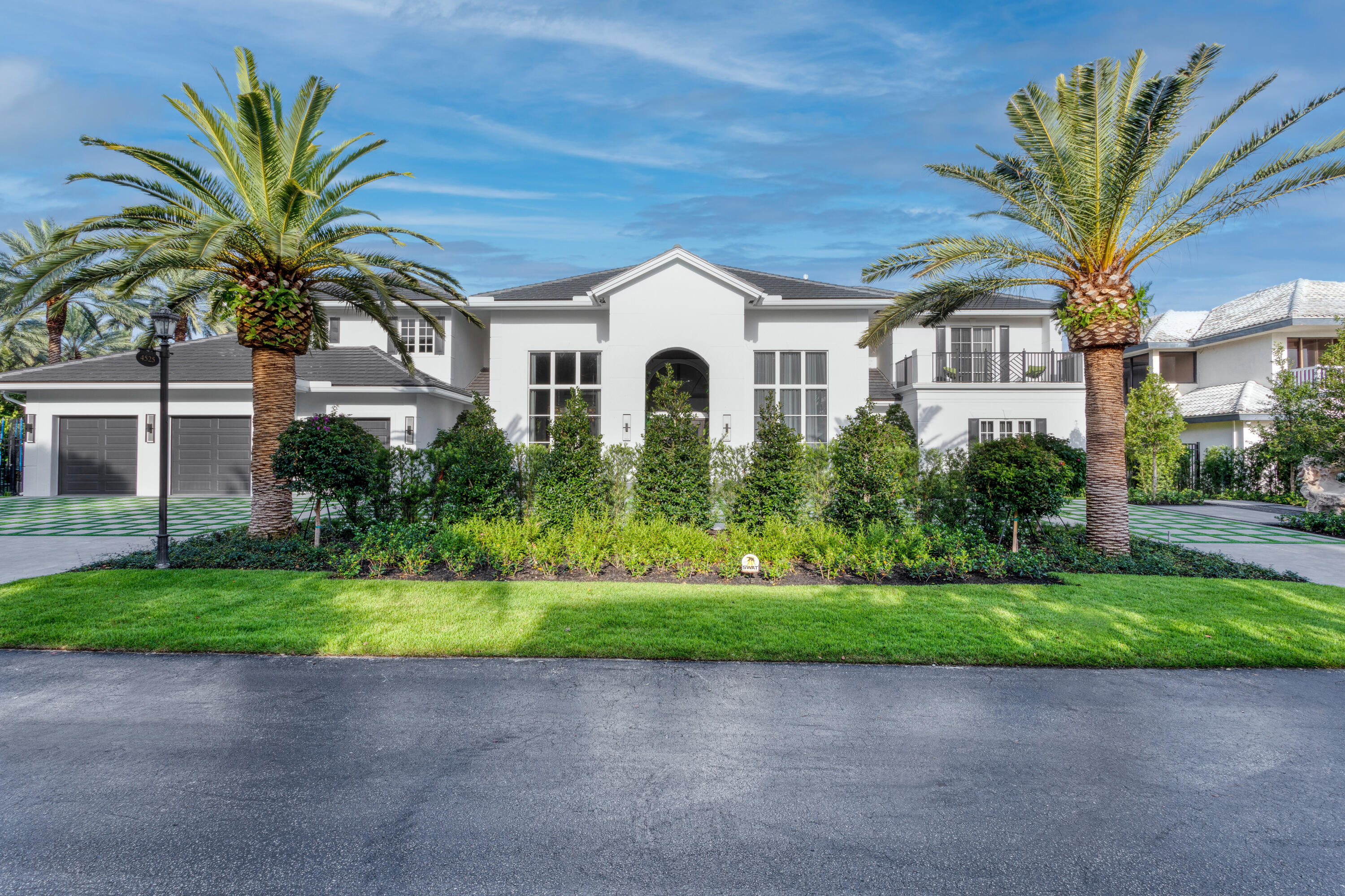 Reimagined Streamline estate, set within landscaped tropical gardens on a rare half acre, is introduced by a marble paver driveway, and ideal for entertaining, in the back yard are a lanai with a summer kitchen and bar overlooking a marble-terraced pool and spa.   With an expansive lawn on a beautifully landscaped half acre, this estate's superbly conceived outdoor entertaining space features a marble-terraced salt-water pool and spa; a firepit; a lanai integrating an outdoor kitchen and bar; outdoor shower; and multiple lounge areas. 

Shown by appointment only. DISCLAIMER: Information published or otherwise provided by the listing company and its representatives including but not limited to prices, measurements, square footages, lot sizes, calculations, statistics, and videos are deemed reliable but are not guaranteed and are subject to errors, omissions or changes without notice. All such information should be independently verified by any prospective purchaser or seller. Parties should perform their own due diligence to verify such information prior to a sale or listing. Listing company expressly disclaims any warranty or representation regarding such information. Prices published are either list price, sold price, and/or last asking price. The listing company participates in the Multiple Listing Service and IDX. The properties published as listed and sold are not necessarily exclusive to listing company and may be listed or have sold with other members of the Multiple Listing Service. Transactions where listing company represented both buyers and sellers are calculated as two sales. The listing company's marketplace is all of the following: Vero Beach, Town of Orchid, Indian River Shores, Town of Palm Beach, West Palm Beach, Manalapan Beach, Point Manalapan, Hypoluxo Island, Ocean Ridge, Gulf Stream, Delray Beach, Highland Beach, Boca Raton, East Deerfield Beach, Hillsboro Beach, Hillsboro Shores, East Pompano Beach, Lighthouse Point, Sea Ranch Lakes and Fort Lauderdale. Cooperating brokers are advised that in the event of a Buyer default, no commission will be paid to a cooperating Broker on the Deposits retained by the Seller. No commissions are paid to any cooperating broker until title passes or upon actual commencement of a lease. Some affiliations may not be applicable to certain geographic areas. If your property is currently listed with another broker, please disregard any solicitation for services. Copyright 2021 by the listing company. All Rights Reserved.