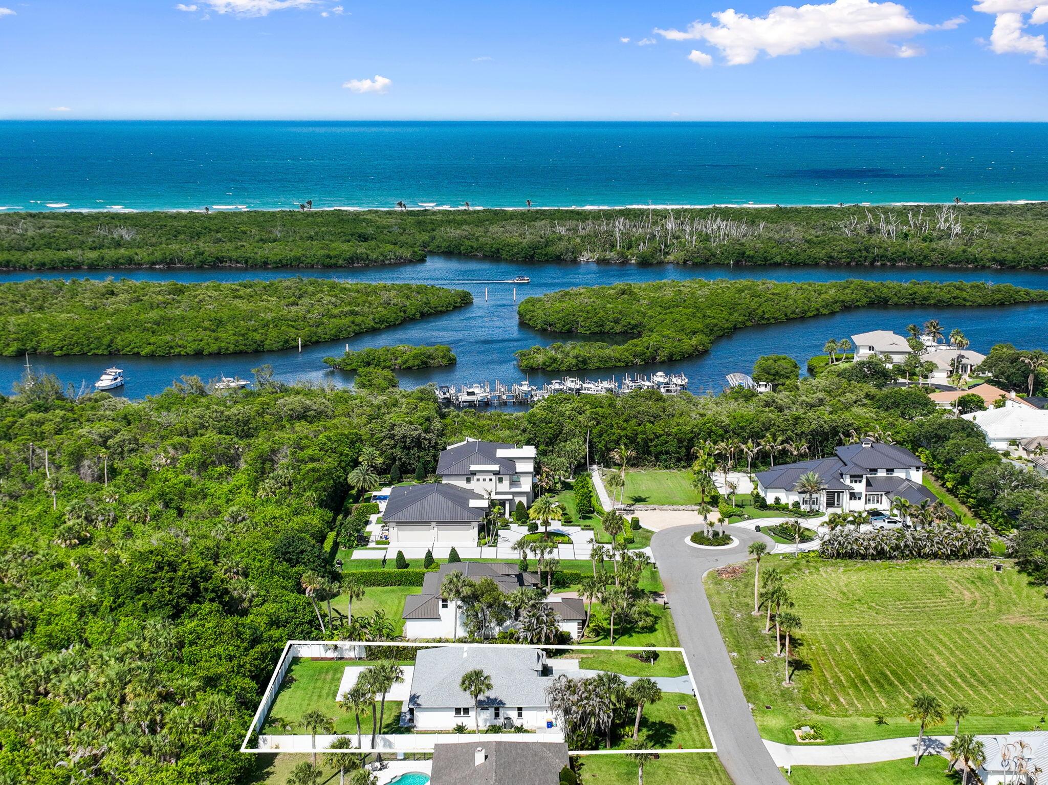 Completely renovated and move-in ready in desirable Pilots Cove, a private 30-homesite community offering a rare blend of modern comfort, privacy, and boating lifestyle. This stunning 4-bedroom home features a newer roof (2020), new flooring (2023), remodeled kitchen (2023), new fencing (2023), new HVAC (2024), custom fireplace (2024), new pool & hot tub with heater (2024), guest bathroom (2025), and luxurious primary bathroom renovation (2025). Pilots Cove includes 21 privately owned boat slips, owned separately by residents and transferable only between Pilots Cove neighbors. No slips are currently available, but future purchase or use opportunities may exist by private agreement.