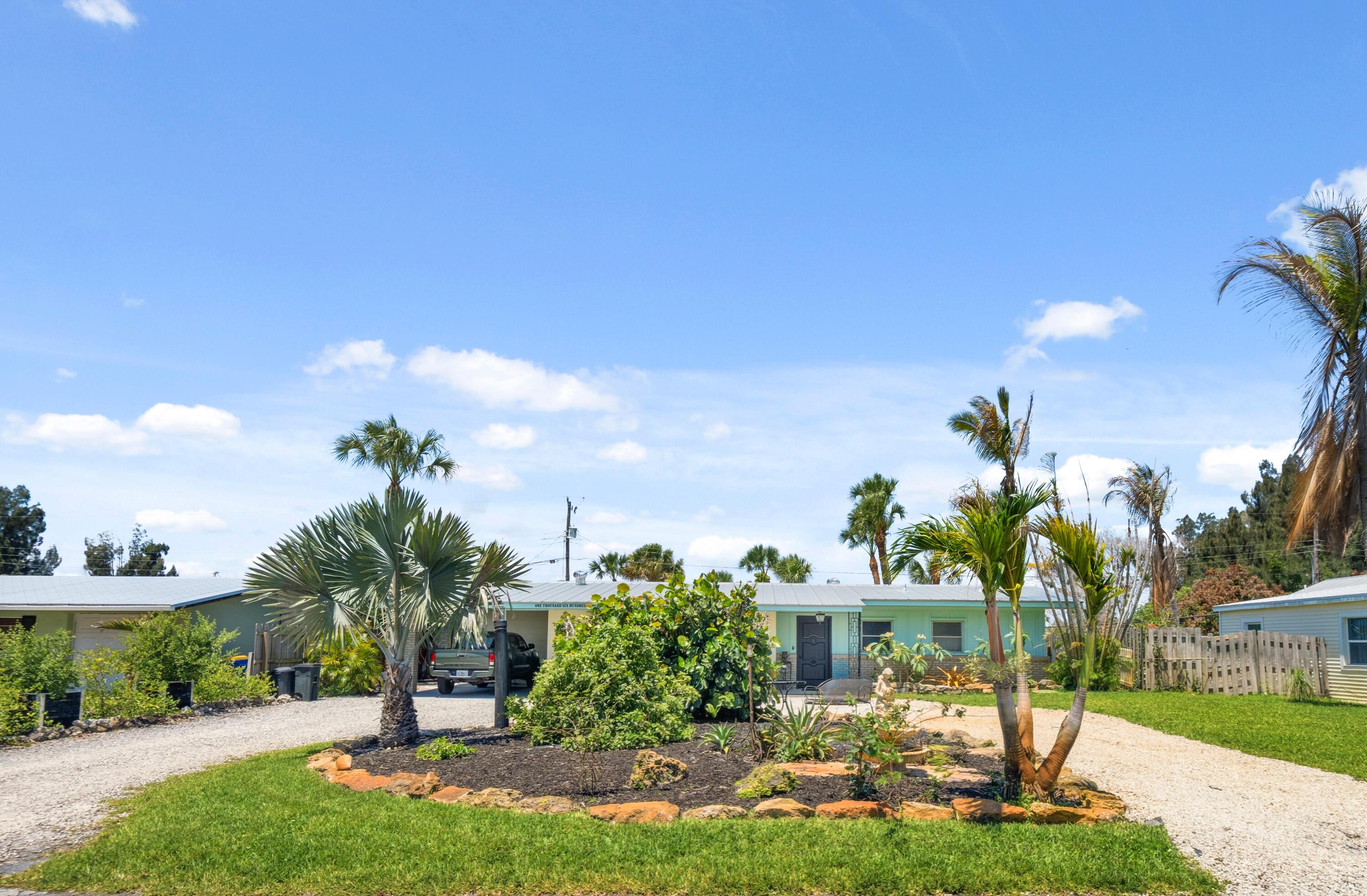 Experience the magic of Rio—Jensen Beach's most storied neighborhood—where the peacocks roam free and the ocean breezes are constant. This "TRUE Floridian" 3-bedroom, 2-bathroom pool home is a masterclass in Mid-Century soul, perfectly blending vintage character with tropical tranquility. Property Highlights Include:  Authentic Mid-Century Design: Step onto gleaming, original terrazzo floors that flow throughout the entire home. The kitchen features real wood cabinetry, while the back room showcases stunning exposed-beam ceilings of Dade County Pine. Classic jalousie windows invite the cross-breezes inside, creating an airy, indoor-outdoor atmosphere that is rare to find today. (see more...) The backyard is a lush "Secret Garden"—a shaded oasis complete with mature fruit trees and a sparkling private pool, perfect for quiet afternoons or weekend entertaining. Functional & Flexible: The third bedroom is currently utilized as a cozy den/office, offering the perfect "work-from-home" flexibility. A half-circle driveway provides effortless guest parking, complemented by a covered carport with dedicated laundry and storage and the metal roof adds modern peace of mind to this classic structure. With NO HOA, you have the liberty to bring your boat, your pets, and your personality. Don't miss this rare opportunity to own a piece of authentic Jensen Beach.