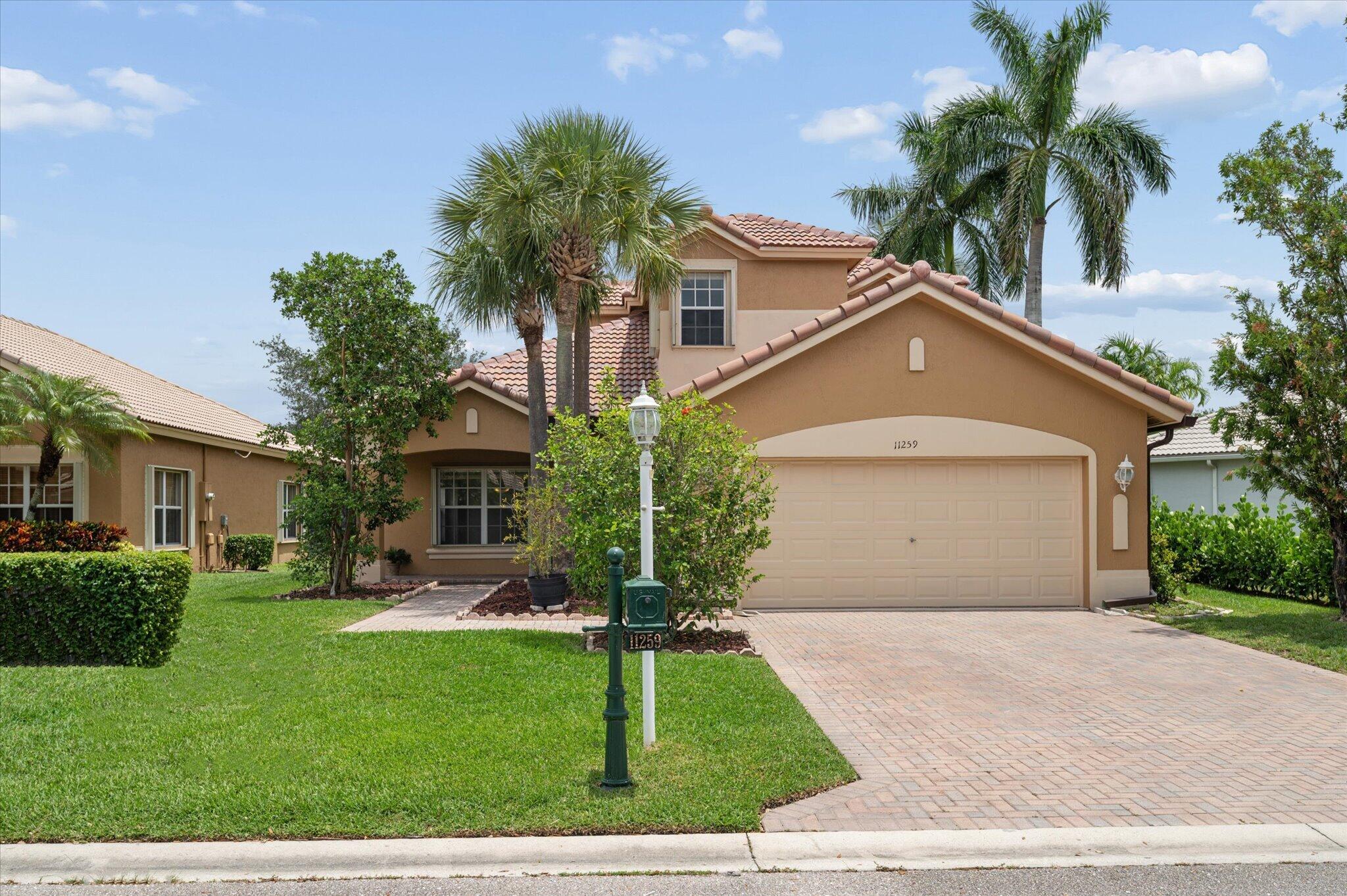 Welcome to this beautiful 4 bedroom, 3 bath waterfront home in desirable Parkland Isles! Featuring a versatile loft ideal for a home office, media room, or play area, this home offers a functional layout with picturesque water views. The kitchen features granite countertops and stainless-steel appliances, while the screened patio provides the perfect place to relax or entertain overlooking the lake. A brand-new 2025 roof offers added peace of mind, and mature fruit trees create your own backyard retreat. Enjoy the resort-style amenities of Parkland Isles, including a clubhouse, pool, fitness center, tennis and pickleball courts, and 24-hour guard-gated security.