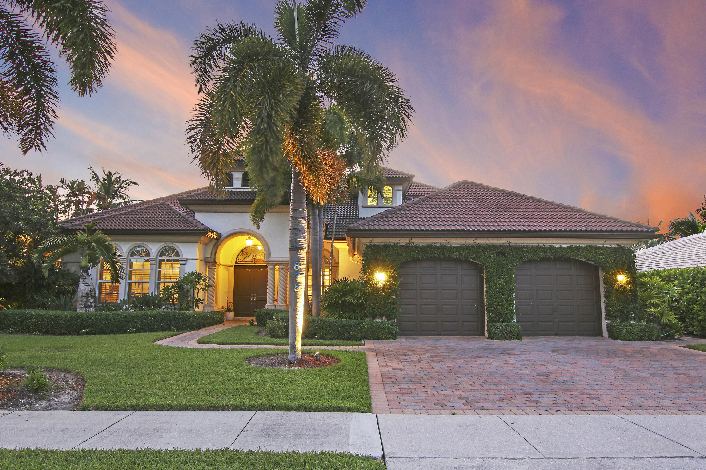 Located on the Village of North Palm Beach's most desired waterfront street, this 5 bedroom, 5 bathroom home offers 100 ft. of deep water frontage on a wide canal with no fixed bridges! The living room's pocket sliders open to the covered patio, summer kitchen & pool area, ideal for entertaining South Florida-style. Enjoy breathtaking sunsets from the oversized balcony. The spacious floor plan includes a large bonus room with a wet bar, 2-car garage with plenty of storage and a new private dock with a boat lift. The home's prime location not only provides direct ocean & Intracoastal access with no fixed bridges but is also just down the street from the newly remodeled North Palm Beach Country Club and its Jack Nicklaus-designed golf course.
