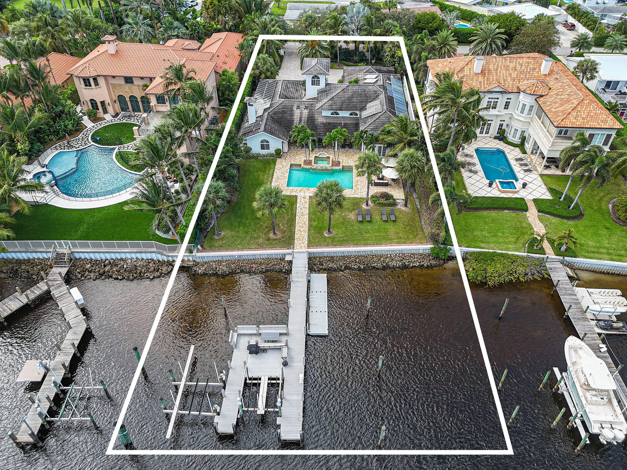Nestled on a rarely available 0.65-acre waterfront lot, this stunning residence offers the perfect blend of privacy, luxury, and boater's paradise living. With over 100 feet of water frontage and three private slips, including a 75-foot boat slip, a 16,000 lb. boat lift, and a 5,000 lb. double jet ski lift—this property is tailor-made for the avid yachtsman. Fully fenced and gated for ultimate privacy, the estate encompasses over 4,700 square feet of living space and 6,478 total square feet, featuring 4 bedrooms, 4.1 baths, and a 4-car garage. Inside, elegant finishes and thoughtful design flow seamlessly throughout, from the gourmet kitchen and butler's pantry to the private home theater and fitness room. The outdoor spaces are equally impressive—perfect for entertaining or simply enjoying the Florida lifestyle. Relax by the resort-style pool and spa, dine al fresco at the full outdoor kitchen and bar, and take in tranquil water views from your own backyard retreat. Located within a serene enclave of Palm Beach Gardens and benefiting from county only taxes, this exceptional property offers a rare opportunity to own a true South Florida waterfront haven.