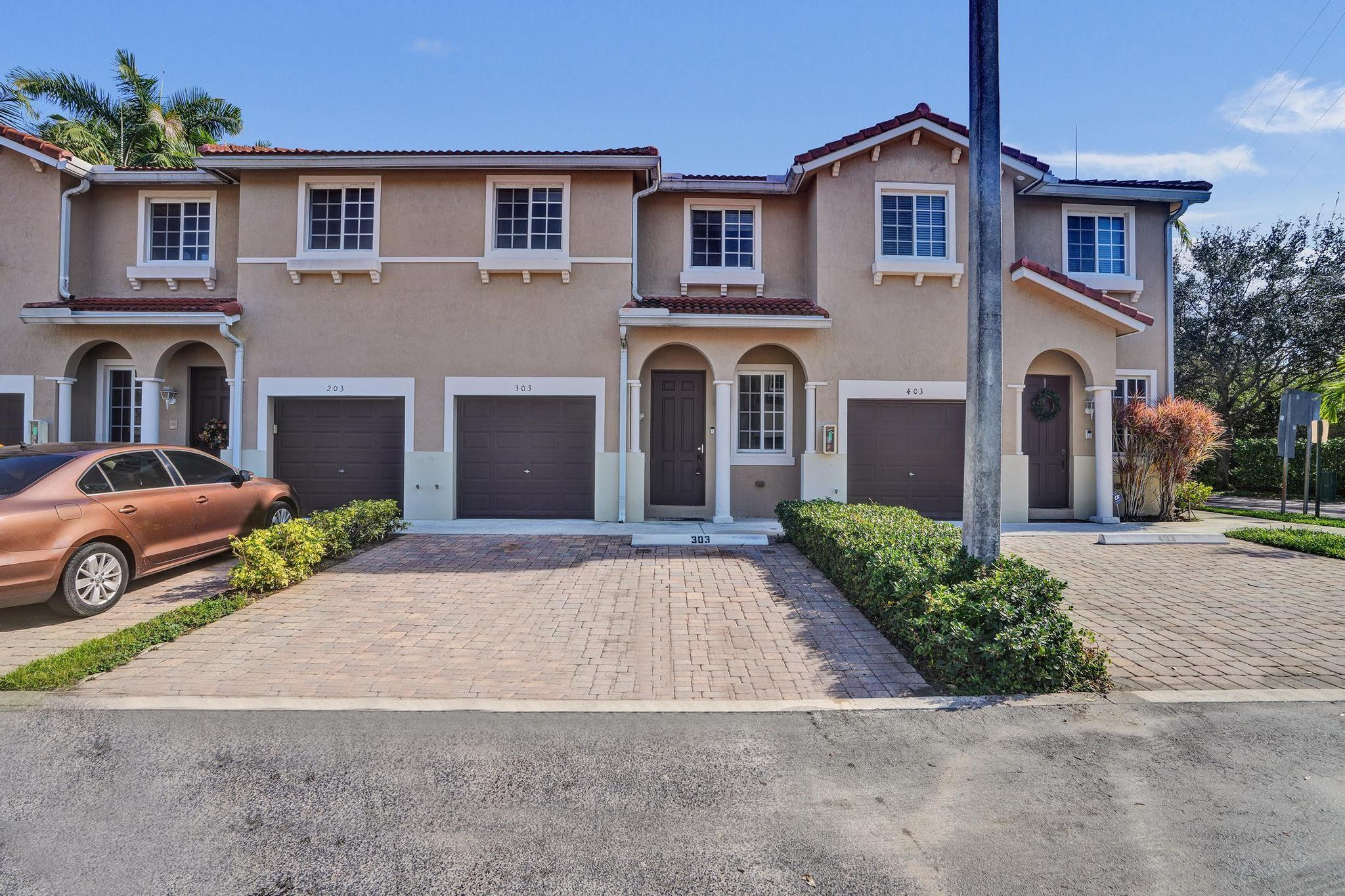 GORGEOUS AND SPACIOUS 4 BEDROOM, 3 BATHROOM TOWNHOUSE IN A SECURE GATED COMMUNITY IN MIAMI GARDENS! THIS 1,720 SQFT HOME OFFERS A BRIGHT AND OPEN LAYOUT WITH A BEAUTIFUL KITCHEN, UPDATED APPLIANCES, FRESH CEILING FANS, AND A BRAND-NEW A/C ONLY THREE MONTHS OLD. THE FIRST FLOOR FEATURES WOOD FLOORING THROUGHOUT, WHILE THE SECOND LEVEL HAS REFURBISHED CARPETING FOR ADDED COMFORT. THE ENTIRE UNIT WAS FRESHLY PAINTED AND TASTEFULLY TOUCHED UP, MAKING IT TRULY MOVE-IN READY. ENJOY A 1-CAR GARAGE PLUS TWO DEDICATED PARKING SPACES RIGHT OUT FRONT. CONVENIENTLY LOCATED NEAR MAJOR HIGHWAYS, SHOPPING, AND DINING. DON'T MISS THIS WELL-MAINTAINED HOME—SCHEDULE YOUR SHOWING TODAY!