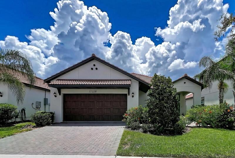 Welcome to this stunning, turnkey residence in the highly sought-after Medley at South Shore Bay, one of Tampa Bay's premier active adult communities. Built just 2.5 years ago, this beautifully maintained home shows like new and is ready for its next owner to move right in and begin enjoying the Florida lifestyle. Step inside to discover a bright, open-concept floor plan featuring gorgeous light gray tile flooring throughout the main living areas, offering the elegant look of natural wood with the durability and easy maintenance today's buyers appreciate. The designer kitchen is the centerpiece of the home, showcasing beautiful white cabinetry with crown  molding, abundant storage, generous counter space, and a spacious center island perfect for entertaining, casual dining, or gathering with family and friends. The kitchen seamlessly opens to the dining and living areas, creating an inviting space filled with natural light and designed for comfortable everyday living. Beautiful window treatments and decorative rods throughout the home add warmth, style, and a finished designer touch. This home has been meticulously refreshed and maintained, featuring fresh interior paint throughout, including ceilings, professionally cleaned tile grout, professionally cleaned bedroom carpeting, and beautifully prepared bedrooms with updated bedding and comforters. Every detail has been thoughtfully completed, making this property truly move-in ready. Outside, enjoy added privacy with a fully fenced backyard, creating the perfect setting for relaxing, entertaining, or enjoying Florida's beautiful weather. For buyers seeking convenience, many of the attractive furnishings throughout the home can be included, making this an exceptional opportunity for a truly turnkey experience. Residents of Medley at South Shore Bay enjoy exclusive access to a private clubhouse featuring a resort-style pool, state-of-the-art fitness center, exercise studio, restaurant, social rooms, pickle ball, art classes and a full calendar of activities, clubs, and events designed to keep residents active and engaged. In addition, homeowners have access to the spectacular South Shore Bay Crystal Lagoon, a breathtaking turquoise paradise offering beach-style relaxation, swimming, kayaking, paddle boarding, and endless recreational opportunities. Whether you are looking for a full-time residence or a seasonal retreat, this like-new home combines modern design, exceptional condition, desirable upgrades, and an unmatched resort-style lifestyle in one of Florida's most exciting communities.  Special assesment to be assumed by buyers as per Prop Manager of the Development.