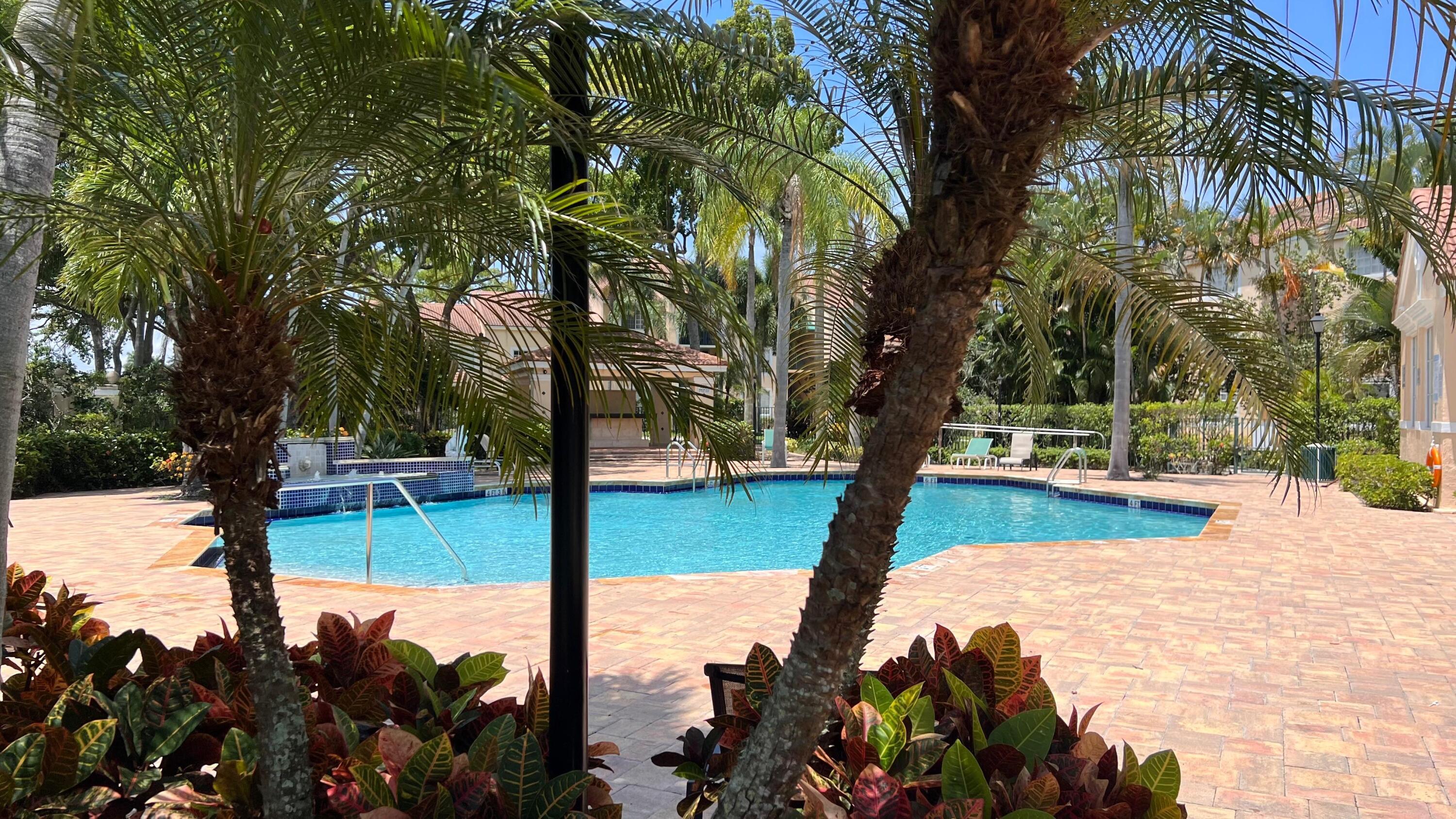 Just bring your toothbrush and clothes! This beautifully maintained 3-bedroom, 2.5-bath end-unit condo is available immediately fully furnished and equipped, or can be rented partially furnished or unfurnished. Located in the gated Milano community, it features an open floor plan, eat-in kitchen, private patio, and in-unit laundry. Enjoy resort-style amenities including a clubhouse, pool, hot tub, fitness center, tennis courts, volleyball court, and grilling areas. Conveniently located near shopping, dining, major highways, and Palm Beach International Airport.