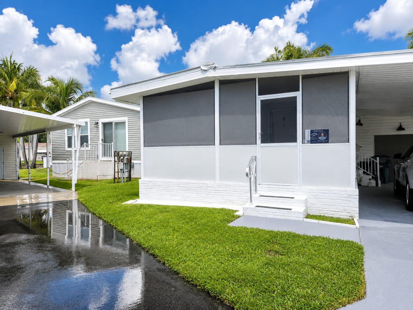 Welcome to this charming 2-bedroom, 1.5-bathroom mobile home situated in the Orange Brook Mobile Home community in Hollywood, FL. Offering 750 square feet of thoughtfully designed living space across a single floor, this residence provides comfortable and practical accommodation. The efficient floor plan makes this property an excellent choice for those seeking accessible, low-maintenance living. Located in the Orange Brook Mobile Home community, this home presents an opportunity to own in an established residential setting. This mobile home is ready for you to make it your own.