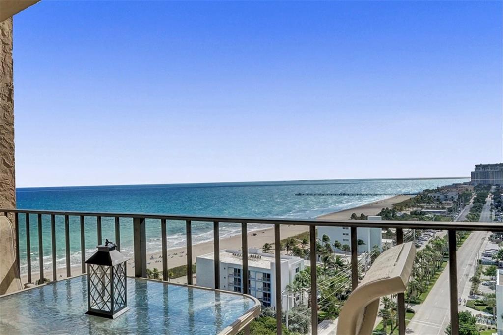 Once-in-a-lifetime opportunity to own this magnificent, impeccably designed 3 bed, 3 bath sub-penthouse oceanfront masterpiece! TWO UNITS COMBINED into one spectacular residence with DIRECT SOUTHEAST OCEAN & INTRACOASTAL VIEWS! Stunning open concept floor plan features chef's gourmet kitchen, 2 master suites, bright & spacious family room, exquisite den/office with built-in bookshelves & bar, and full-size laundry w/extra storage & utility sink, providing abundant, well-designed space to work and play. ALL IMPACT windows & doors. Live the ultimate resort lifestyle experience at Sea Ranch Club: 8 tennis courts, 3 heated swimming pools, beachfront BBQ area, library, fitness rooms, organic herb garden, 24-hour security, and garage parking on 14 acres of lush, manicured grounds. Dog friendly! Showings begin 1/13/22. Listing agent will accompany all showings. All persons entering the unit are required to wear a mask. Please submit POF or pre-approval letter with offers. Parking spaces #2 (best location, close to elevator) and #112, both upper level garage. Turnkey furnished. Bronze statue in foyer does not convey.