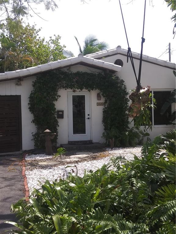 Located in the desirable and well sought after Poinsettia Heights neighborhood, this charming 2-1 home sits in a nestled tropical paradise.This home is a 2-1 which can easily be converted back into a 3 bedroom. Beautiful updated kitchen with subway tiles and stainless appliances. Updated bathroom with walkin shower and stone shower floor. Master bedroom opens to screened lanai. Hurricane windows and doors. Fire/Carbon monoxide alarms hard wired throughout home. Large tropical backyard with Zen water fountain. Storage shed.