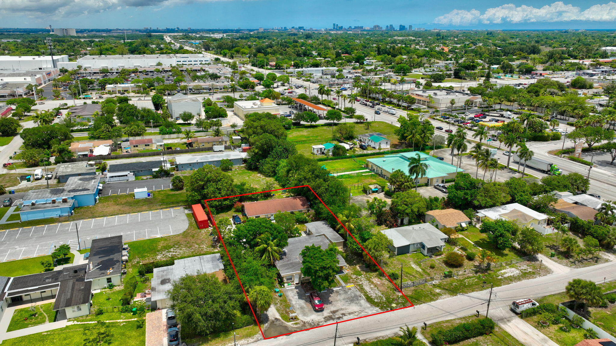 Excellent opportunity to acquire a well-maintained 6-unit multifamily property in South Florida. The property consists of three separate buildings on one parcel: a front triplex with two 1 bed/1 bath units and one 3 bed/1 bath unit, a rear duplex with two 2 bed/1 bath units, and a standalone 1 bed/1 bath cottage. Several units feature private fenced backyards, enhancing tenant appeal and retention. One of the 1 bed/1 bath units will be delivered vacant in June, allowing for immediate rental upside. Each unit has it's own electric meter. Current gross rents total $8,900 /month or $106,800/year. Rents are significantly below market, providing a strong value-add opportunity. Market rent estimates: 1 bed units $1,600-$1,750, 2 bed units $1,900-$2,000, and 3 bed units $2,500+. Pro forma gross income is approximately $133,200 annually. Lease terms and current rents: Unit A (1 bed/1 bath): $1,300/month - Month to Month at Will Unit B (1 bed/1 bath cottage): $1,300/month - Month to Month at Will Unit C (3 bed/1 bath): $1,500/month - Month to Month at Will Unit D (1 bed/1 bath): $1,350/month - Month to Month at Will Unit 3075 (2 bed/1 bath): $1,650/month - lease through 10/31/2026 Unit 3077 (2 bed/1 bath): $1,800/month - lease through 3/31/2027 All leases transitioning to month-to-month at expiration for added flexibility. Two on-site laundry machines are available for tenant use, generating additional passive income via refillable laundry card systems—no coin collection required. Property is in overall good condition with no major deferred maintenance. At the current income level, the property operates at a cap rate of approximately 5.3%. Based on market rents, the pro forma cap rate increases to approximately 6.9%+. This is an excellent opportunity to acquire a stabilized income-producing asset with immediate upside potential in a highly desirable rental market. Offered at $1,125,000 ($187,500 per unit). Rent role attached in MLS. Total monthly rent = $8,900/month Annualized = $8,900 × 12 = $106,800/year