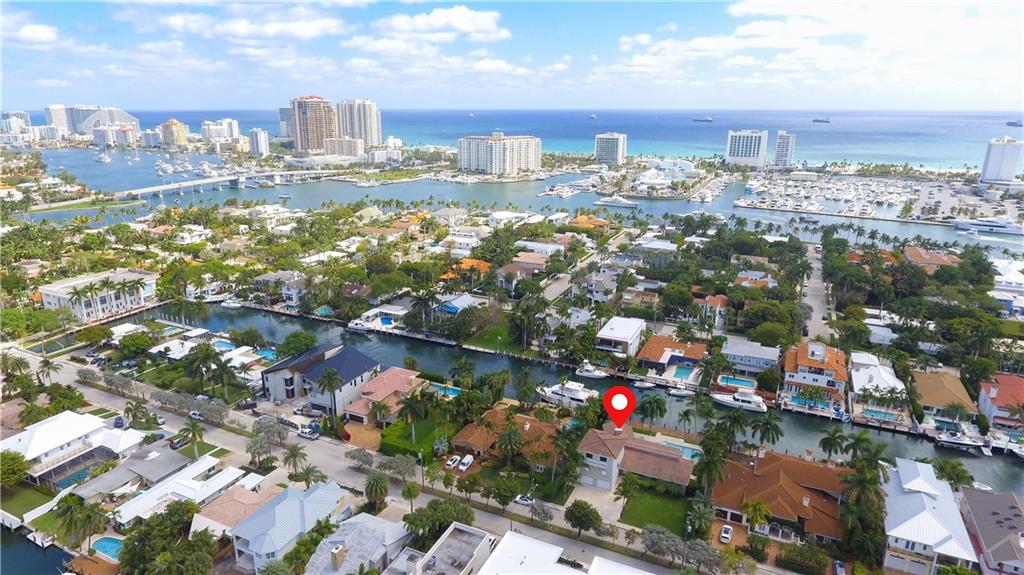SOUTH FLORIDA YACHTER'S PARADISE-100 FT INTRACOASTAL FRONTAGE-NO FIXED BRIDGES-EASY OCEAN ACCESS. Located in Exclusive Riviera Isles, just off Las Olas & walking distance to Beach, Restaurants, & Shops. Beautifully updated 5 Bed, 5.5 Bath home w/ high-end features & smart home automation. Boasting a Luxurious Master Suite & private 2nd Bedroom Suite on 1st floor; Two Bedrooms & Bath on 2nd floor; Huge 2nd Master Suite on 3rd floor; Marble floors, vaulted ceilings, open chef's kitchen w/ granite countertops, gas cooktop & stainless appliances. Newer ACs/water heater/pool equiptment. Heated Pool/Spa w/ Eastern exposure & breathtaking views, surrounded by mature landscaping that offers exceptional privacy not easily found in the Heart of Fort Lauderdale! No Rental Restrictions. Private Dock.