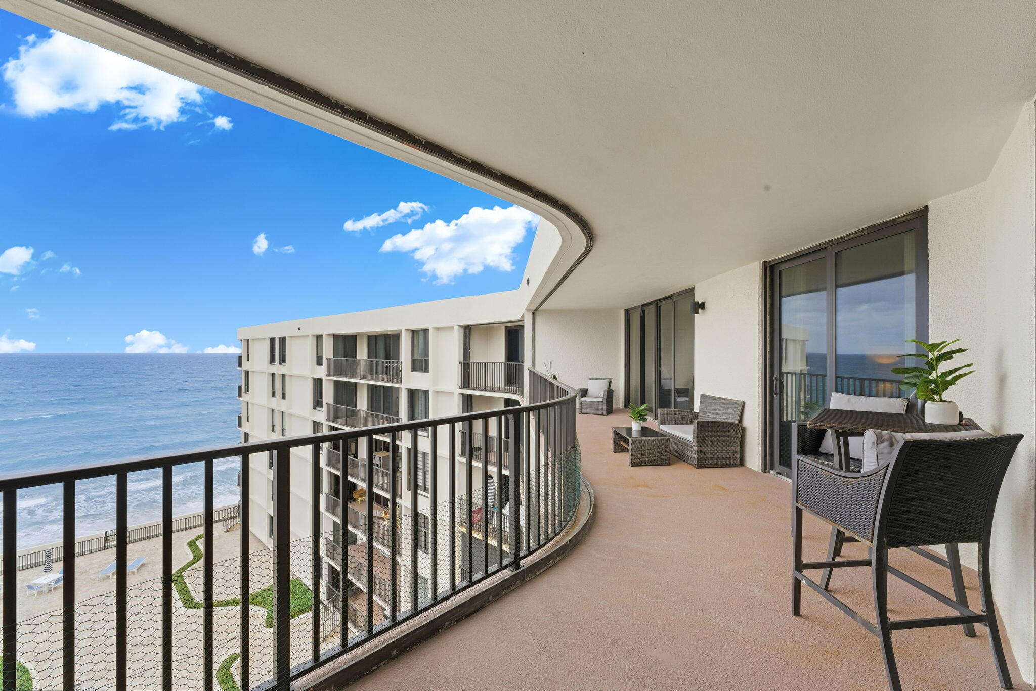 Don't miss out on this direct ocean view Penthouse condo! Stunning view, skylights, open kitchen, 2 covered parking spots, totally renovated lobby, gym, and more! Walk to the Eau, Publix, restaurants and Plaza Del Mar.