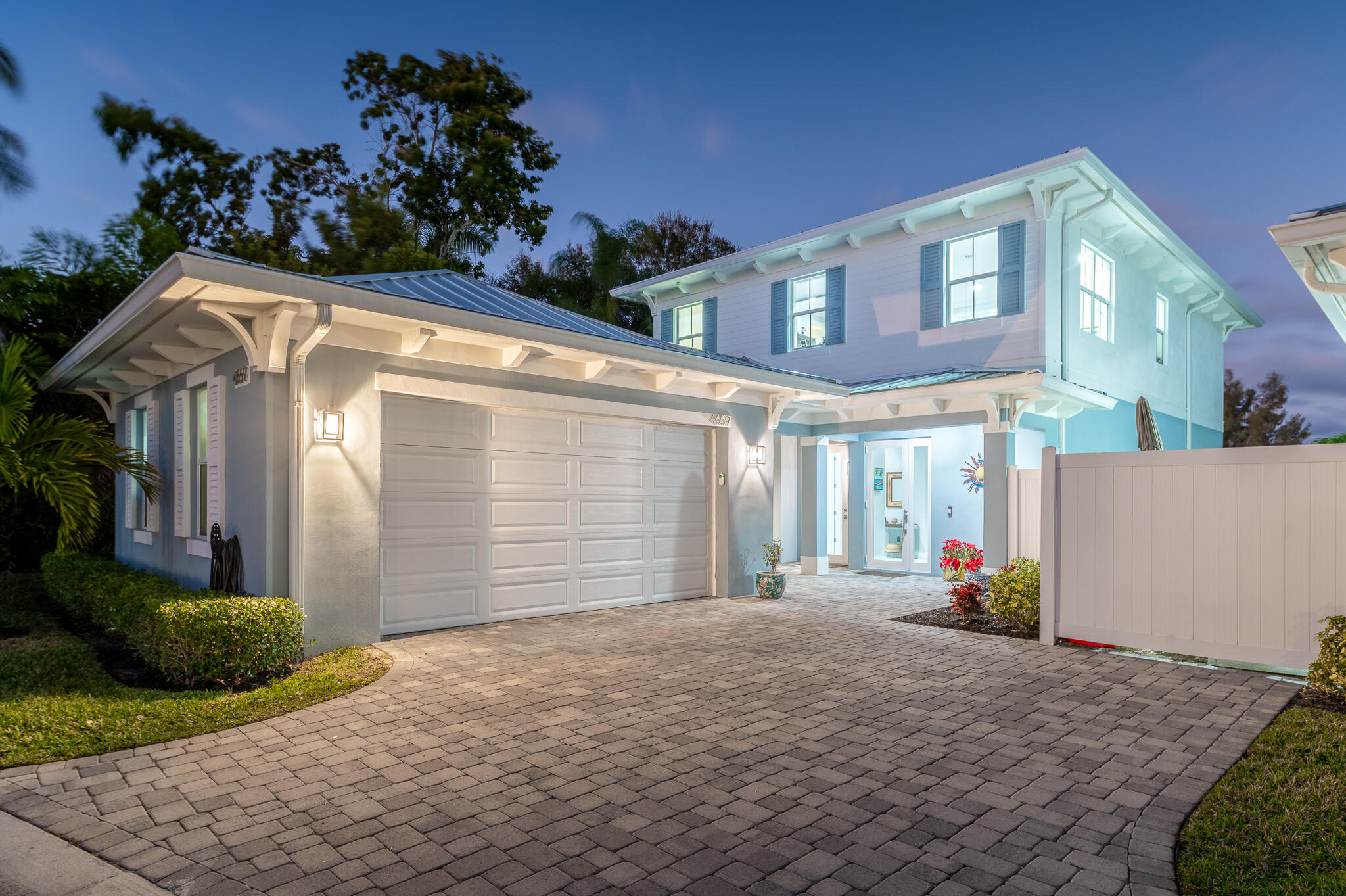 WATERFRONT HOME with boat dock and 10K LB lift. CBS construction with 3 bedrooms, 2.5 bathrooms and 2 car garage. Custom Key West Style Home with designer touches as custom lighting, cabinetry, quartz counter tops, custom built in in office, paver driveway and breeze way, impact windows and doors, beautiful large ceramic tile and luxury vinyl plank floors on second floor. Imagine boating just minutes to the inlet and popular ''Sandbar'' and many local restaurants and shopping within walking distance. Perfect location to enjoy the FLORIDA LIFSTYLE!