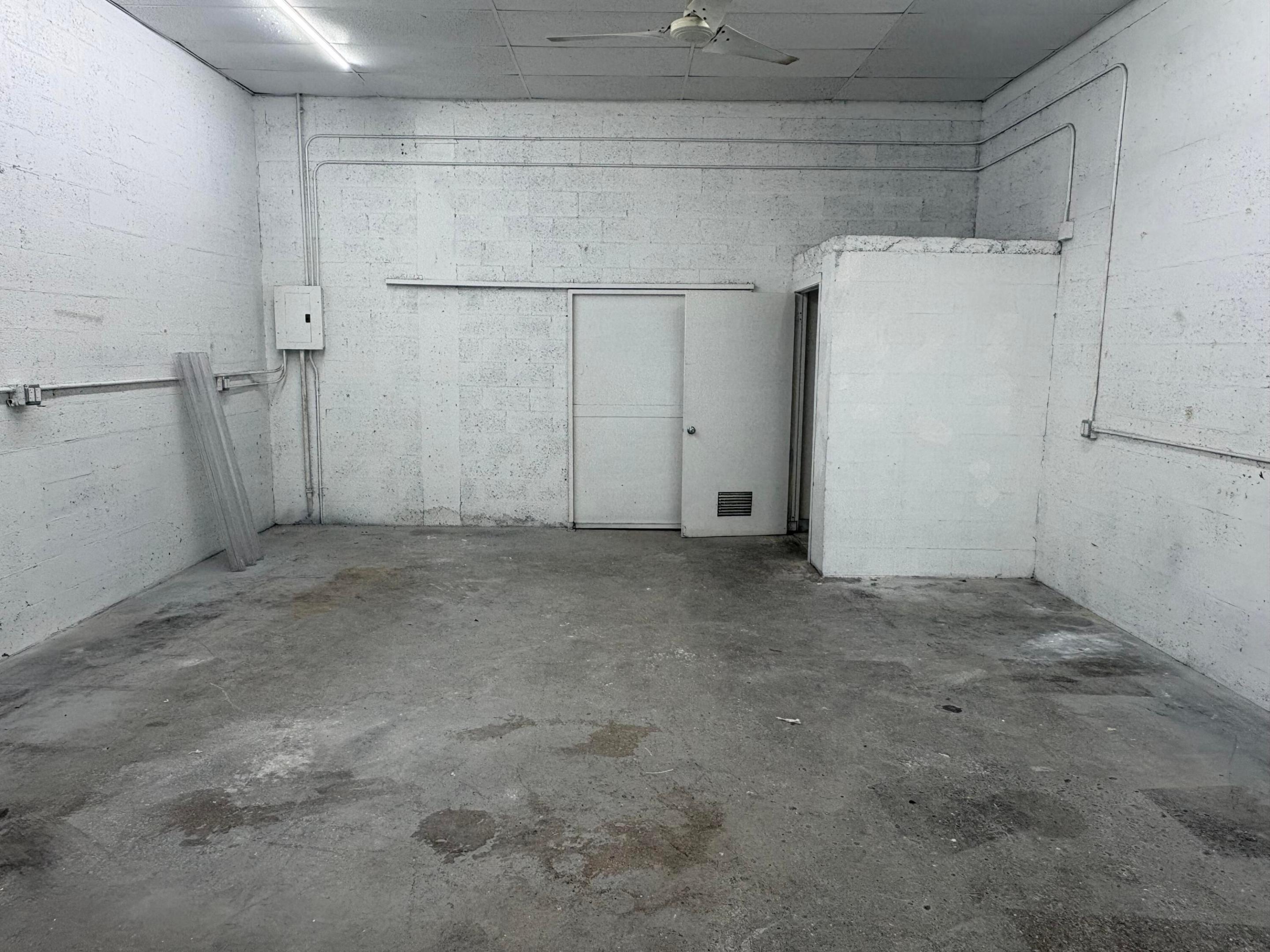 Rarely available affordable air-conditioned warehouse space available immediately near Downtown Fort Lauderdale with quick access to I-95. Ideal for office, showroom, creative studio, gym, contractor, e-commerce, light industrial use, or secure storage. Located in B-3 zoning with excellent accessibility and functionality. Property improvements coming soon include new roof, new A/C system, updated electrical, impact windows and doors, and grade-level overhead door. Features soaring 20' ceilings and flexible open layout. Landlord willing to negotiate tenant improvements for qualified tenants. Secure your space now while rates remain attractive.