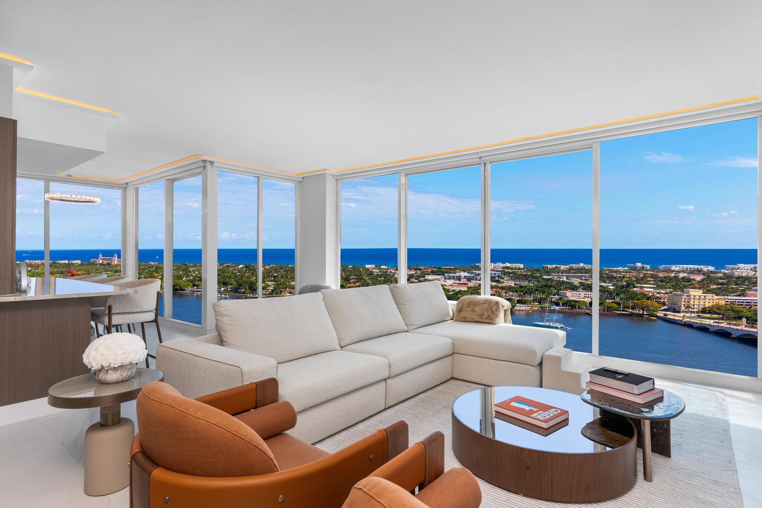 Experience elevated living from the 23rd floor of the prestigious Plaza of the Palm Beaches. This exceptional residence offers 2,091 square feet of sophisticated living space, featuring three spacious bedrooms, two and a half bathrooms, and an open, light-filled floor plan. Expansive windows showcase breathtaking panoramic views of the Intracoastal Waterway, Palm Beach Island, and the downtown West Palm Beach skyline. Perfectly positioned in the heart of downtown, you're just moments from world-class dining, shopping, entertainment, marinas, and Palm Beach's renowned beaches. Experience the perfect blend of luxury, convenience, and spectacular views in one of West Palm Beach's premier waterfront addresses.