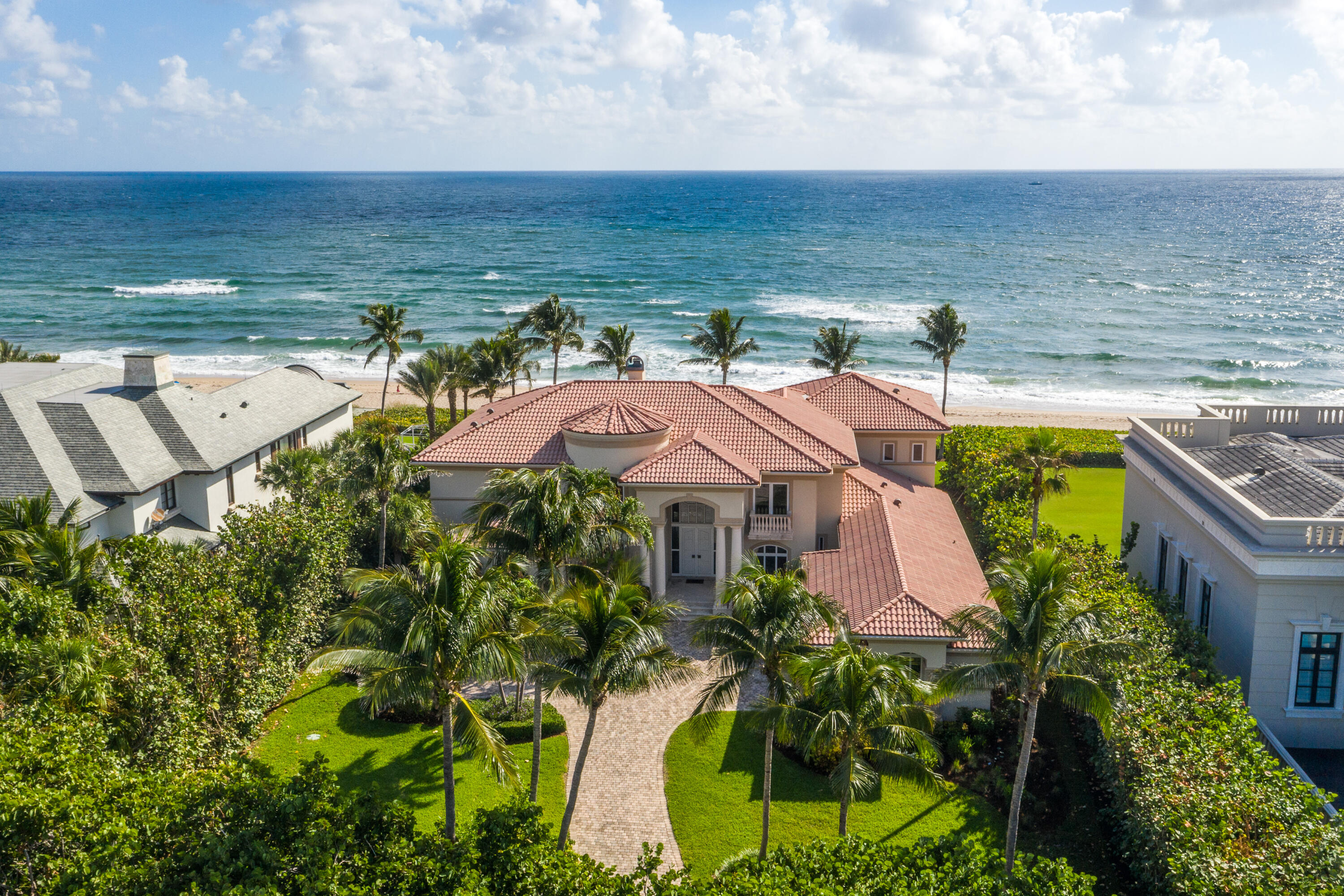 Nestled within the charming Town of Ocean Ridge, this Oceanfront Estate offers an unparalleled blend of privacy, sophistication, and coastal splendor.  This special home offers an oasis of refined Florida living at its best where the rhythms of the crashing waves meet timeless Mediterranean style architecture.  Beyond the gated entry, the lush tropical landscaping welcomes you into a world of calmness.  Inside soaring ceilings, expansive ocean views, and curated interior design finishes throughout. Witness the breath-taking sunrise and feel the cool night breeze.  Located between Delray Beach & Palm Beach, you have all the culture, shopping, and restaurants one could imagine.  This coastal, casual family friendly rental, offers a wonderful retreat for making special family memories.