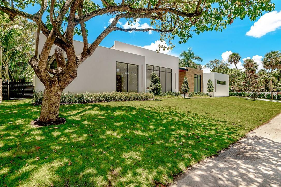 Iconic Brand New Contemporary Estate situated over 0.41 acre with 150 ft. deep water frontage, ideal for boat lovers ready to bring home a boat! This beautiful setting has 2 docks, one 100 ft. wood dock and a land dock for small water vessels. Featuring over 6,500 sf. indoor and outdoor living spaces tied together by the use of glass, water and light, this one story masterpiece includes 5 bedrooms and 5.5 bathrooms, 12 ft. high garage designed for 3 cars & 3 car lifts, high ceilings, European Kitchen with Dacor appliances, Italian solid 8 ft. doors, Italian porcelain floors, large contemporary pool with spa, all build with highest level of quality, detail and craftmanship.
