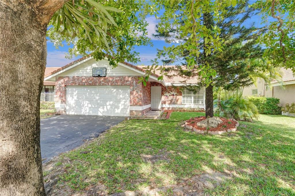 This is the house you were waiting for!! First time on the market in over 20 years! The owner is very caring and has kept this home in great condition. Updated kitchen and baths, freshly painted inside and out, roof only 6 years old, HEATED pool, large patio great for entertaintment.  Located in the heart of the Coral Springs, in a very safe, family oriented neighborhood and within the boundries of the highly desirable Stoneman Douglas High Shool. Everything you need is just few steps away, including Broward Health Coral Springs Hospital, City Hall and building department,  Mullins Park, Coral Springs Police Department, Post Office, Northwest Regional Library, most major banks, grocery stores, restaurans, coffe shops, farmer's market during the winter and spring seasons and more. No HOA.