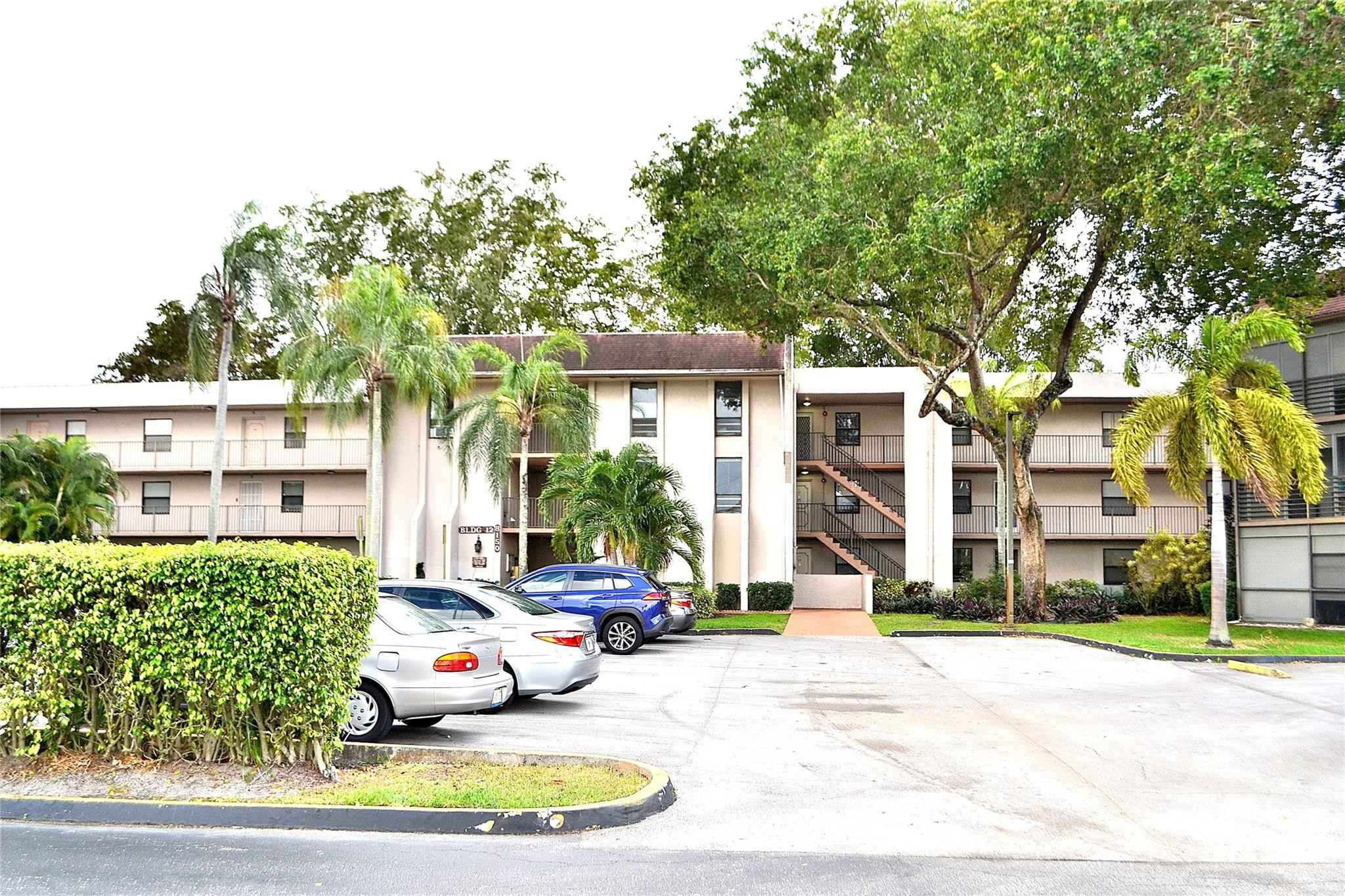 Beautiful 2BR/2BA condo with gorgeous golf course views. Bright eat-in kitchen features recently updated quality soft-close cabinets, granite countertops, stainless steel appliances, and opened pass-through. Laminate flooring throughout main living areas, carpet in bedrooms, and washer/dryer in unit. Spacious screened and tiled patio overlooks the golf course — perfect for relaxing or entertaining. Newer roof, updated elevator, and Freshly painted exterior. Water and basic cable included. Pool just steps away. Association states 55+. No renting. No pets. Minimum 650 credit score required. Excellent location close to shopping, highways and more!