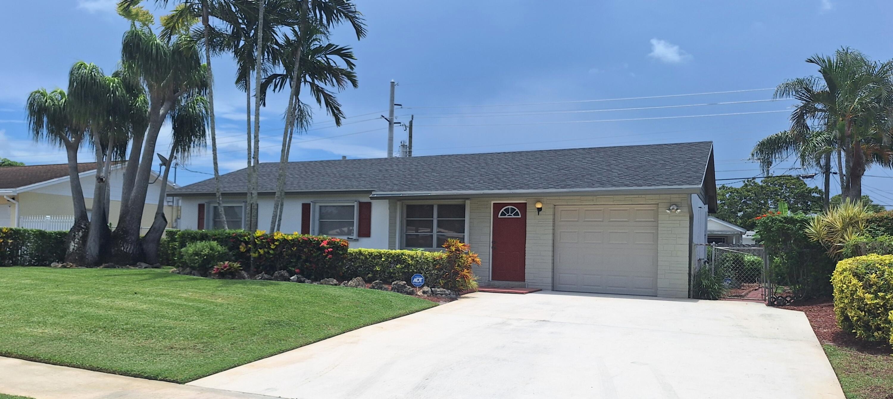 Welcome to this charming and beautifully maintained 3-bedroom, 2-bathroom single-story residence in Royal Pines, West Palm Beach. This well-proportioned home offers 1,092 square feet of finished living space, providing comfortable and efficient layout for everyday living. The single-car garage offers convenient vehicle storage and protection. Fenced yard in the back has mature landscape for relaxing and entertaining. Present owners keep this super clean and well maintained. New roof, new central a/c, paint, garage door, accordion hurricane shutters and termite warranty in effect. One look and you will see the attention to detail and pride of ownership that the present family has placed into this home. Come see and you will be​​‌​​​​‌​‌​​​‌‌​​​‌‌‌​​‌​​‌‌​​​​ sold.