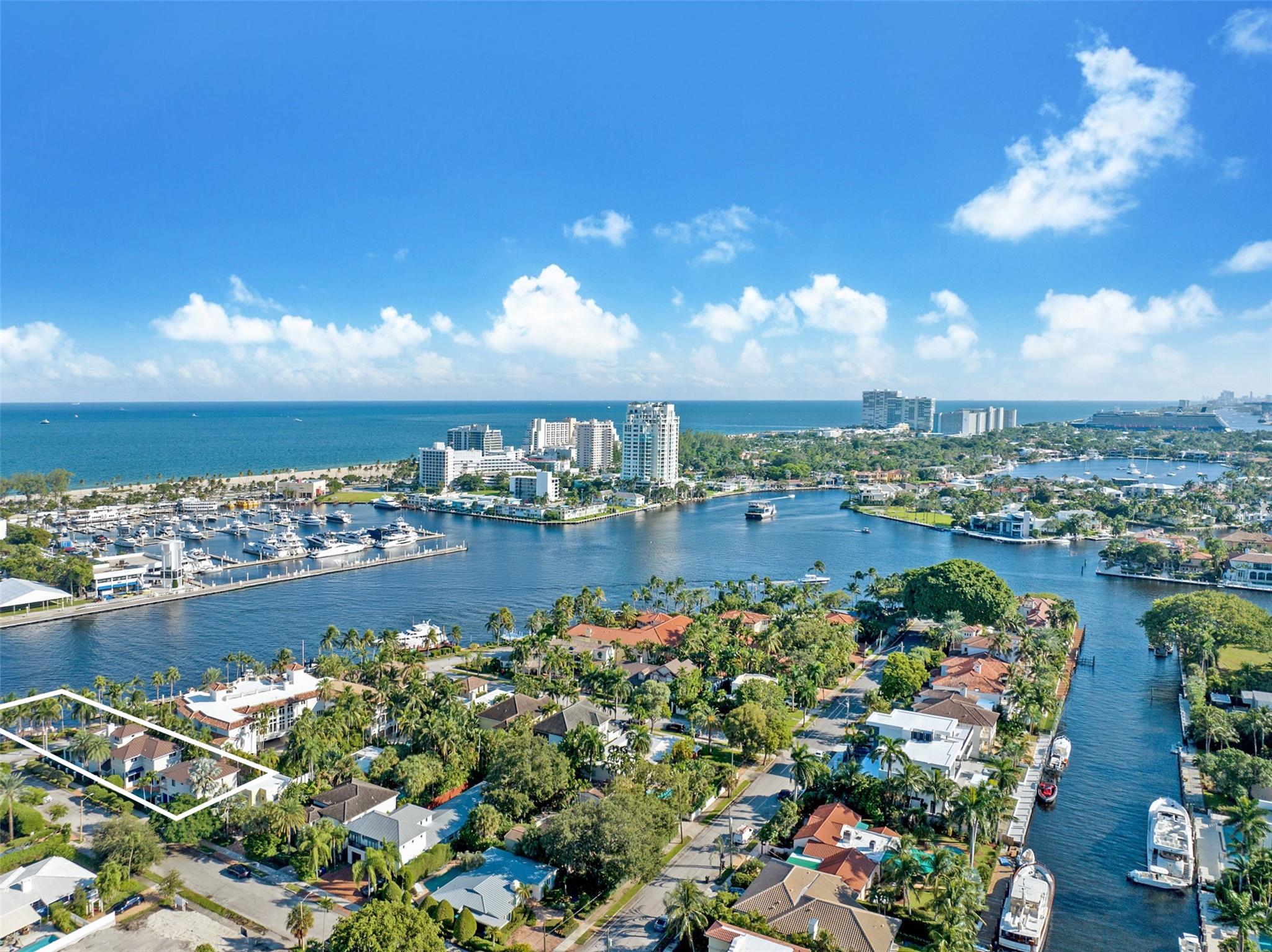 A rare opportunity to live on prestigious Idlewyld Dr. Enjoy unparalleled Intracoastal views and daily endless boat parade from this contemporary 2-story + 3rd floor sky lounge & rooftop deck residence. Boasting high ceilings, open floor plan seamlessly connecting the living room, dining room, breakfast nook & gourmet kitchen with oversized island and top-of-the-line appliances. Additional: media room, bar area, office and sunroom. The primary features 2 walk-in closets, spa-like bathroom. Outdoor: waterfront patio with summer kitchen, heated pool and spa. New deep-water dock in a NO-WAKE ZONE, with easy ocean access and no fixed bridges. Generator. Detached 2beds, 2baths Guest House with full kitchen, living room and laundry. Secure Location. Steps away from dining and sandy beaches. Same as above