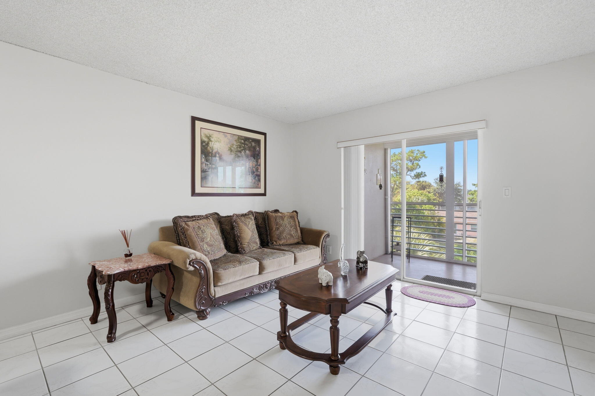 Welcome to this 2-bed, 1-bath condominium located in the 55+ Lake Clarke Gardens Condo in Lake Worth, FL. UNIT CLOSE TO ELEVATOR! Offering 894 square feet of finished living space, this unit provides an efficient layout for comfortable daily living. UPDATED KITCHEN with granite countertops, all hard flooring, large screened in patio, roll down shutters and impact windows. The thoughtful floor plan maximizes the available square footage, making practical use of each room. Situated in an established community, this condo is a great location with walkability and convenience. Community offers a pool. Water, cable, internet included through condo association.