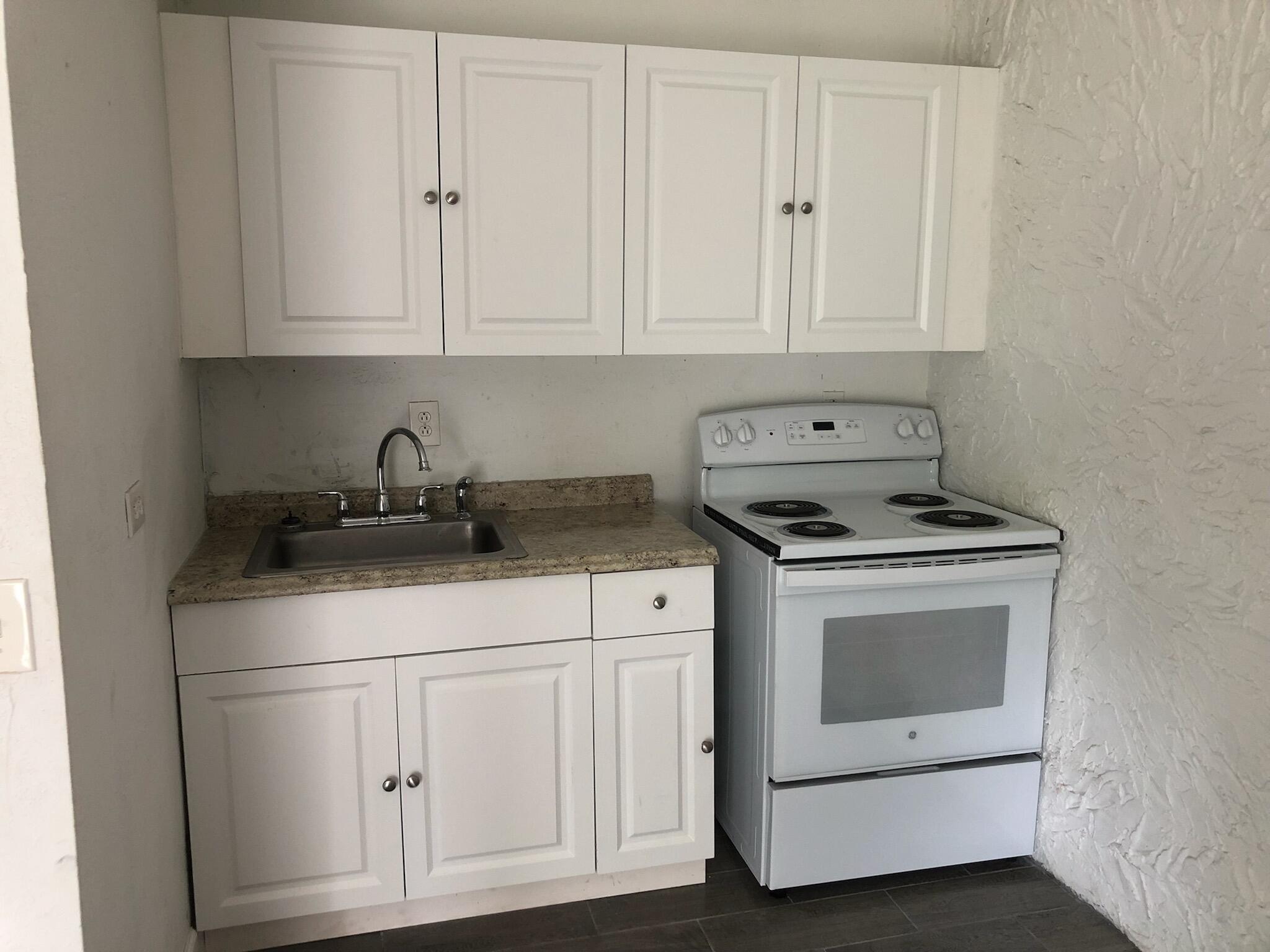 QUAINT one bedroom , one bath  in this triplex, corner lot, ideal for commute to city place ,  private parking, includes water and sewer. next to flamingo park, quiet area  , high way but minutes  minutes away, city place near by minutes, shopping everywhere
