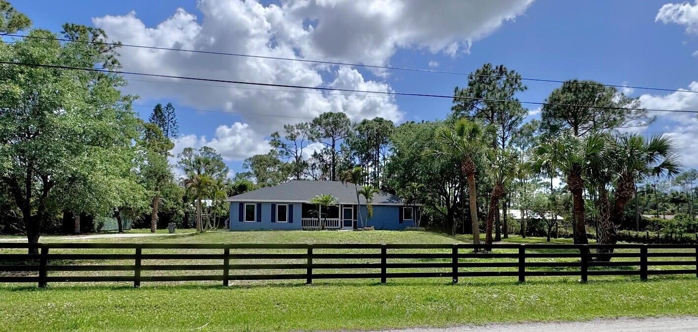 EVERYTHING YOU NEED...Ready for your business and equipment, with room to grow! NEW 2026 Roof, Hurricane Impact Windows & Doors, Updated Kitchen and Bathrooms, all NEW Appliances, Freshly Painted inside & out, Fully Fenced, Large Storage Container, NO Pond. Private and well-maintained property.