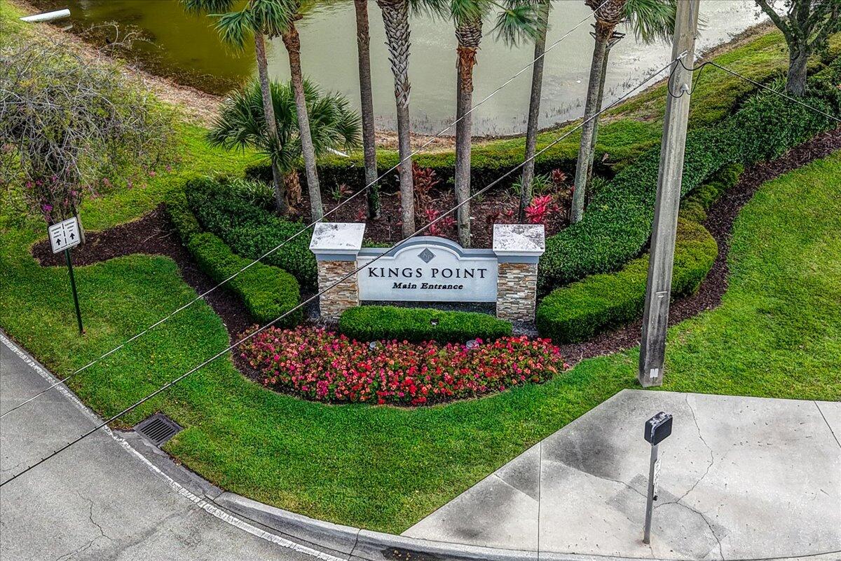SELLER FINANCING AVAILABLE UP TO $50,000 ask for details, very motivated seller. Direct waterfront villa in Kings Point's Valencia section with rare wide-lake views from a glass-enclosed Florida room with accordion hurricane shutters. In-unit washer/dryer. Zone X, no flood insurance required. Resort-style 55+ living: golf, pools, clubhouse, tennis, fitness, theater, 24/7 gated security. Minutes to Atlantic Ave, the beach, and Delray Medical. Move-in ready and rarely available with this view.