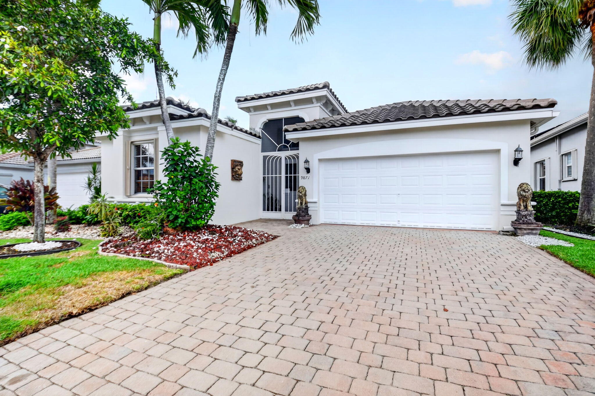 Experience the ultimate 55+ active adult lifestyle in Bellaggio, one of Palm Beach County's premier resort-style communities. This beautifully maintained 3-bedroom, 2-bath home features a brand-new roof (2026), stunning lake views, accordion hurricane shutters, 2 car garage and a welcoming screened entry. The bright, open floor plan offers high ceilings, spacious living areas, and a versatile third bedroom perfect as a den, office, or guest room. Relax on the expansive screened (birdcage) patio overlooking the lake and enjoy spectacular views. Bellaggio offers resort style living with a 36,000-square-foot clubhouse, indoor and outdoor pools, fitness center (offers PT), tennis, pickleball, bocce, café, ballroom entertainment, clubs, classes, and a Lifestyle Director. Everyday is a vacation!