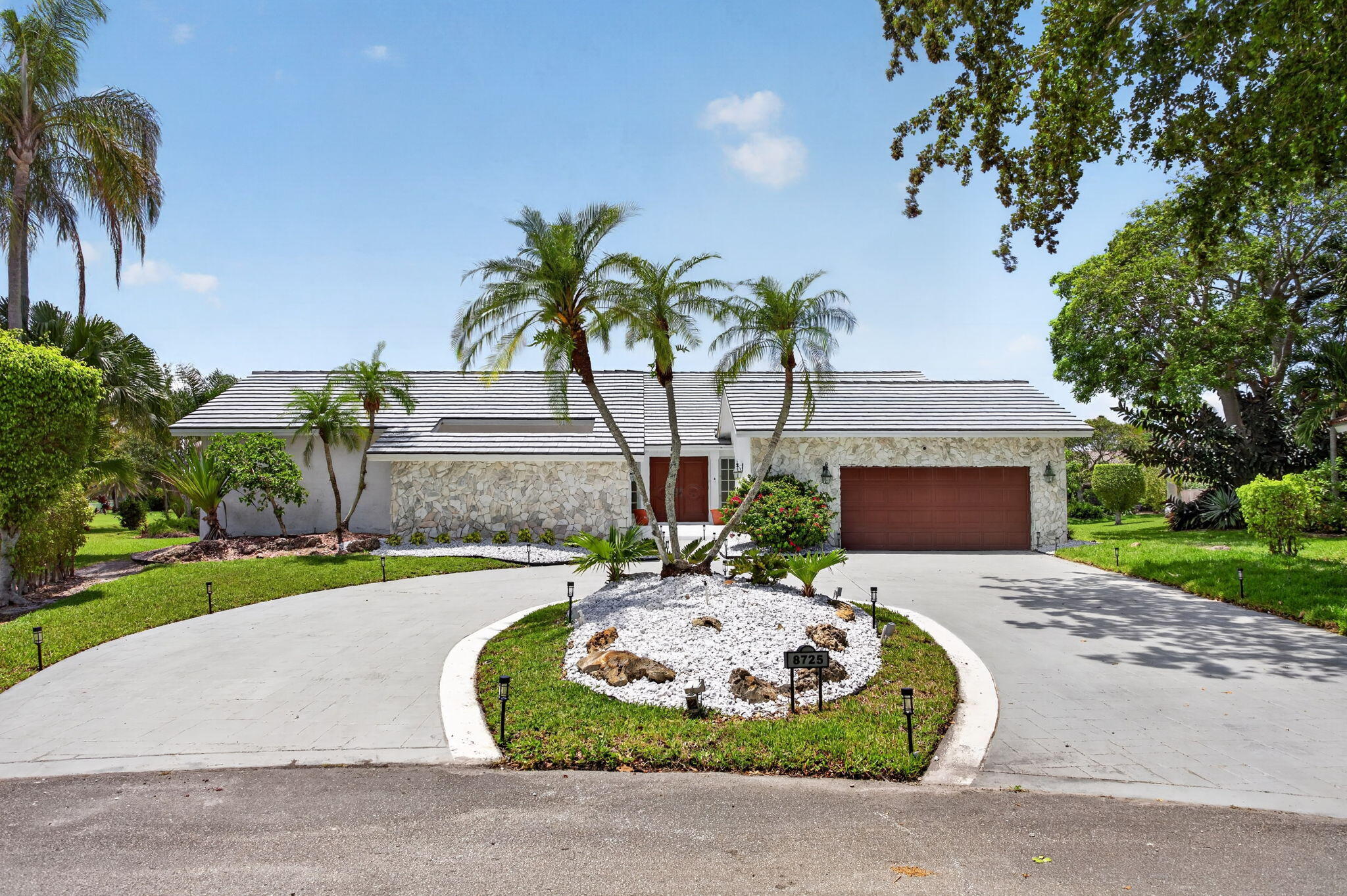 Stunning waterfront residence on oversized point lot w/ sweeping water views & added privacy, featuring a pvt pool, refreshed landscaping & courtyard w/ water feature. Spacious 3-way split flr plan, marble flrs in main areas, high ceilings & natural light t/o, offering an inviting traditional layout w/ oppty to personalize to today's style preferences. 2026 upgrades incl new roof w/ hurricane straps, upgraded int/ext elec panels, improved A/C elec comps & TAP attic insulation, updated door locks, garage spring & sprinkler sys. Home is equipped w/ some impact windows & doors + GE Lexan storm panels. Updated ADT sec sys w/ smoke & glass break sensors & 3 ext cams. Pool w/ new pump & 3-way valve, ideal for relaxing/entertaining. Amenities incl clubhouse, fitness ctr, pool & tennis​​‌​​​​‌​‌​​​‌‌​​​‌‌‌​​‌​​‌‌​​​​ courts.