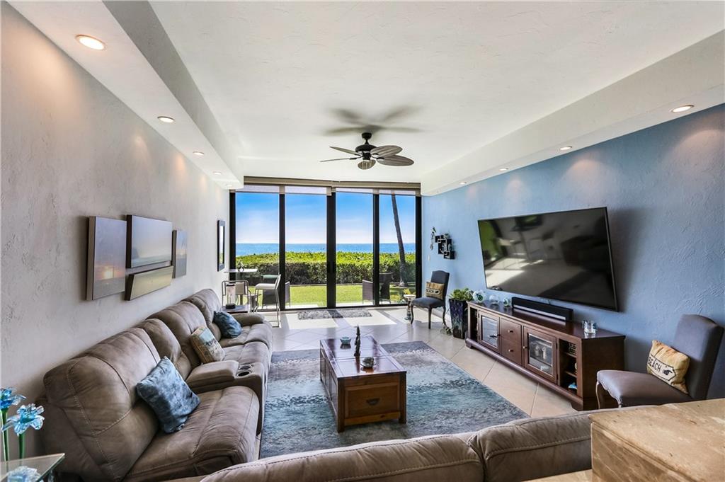 Paradise at its finest 2 2/1/2 first floor ocean front townhouse just walk out your sliding glass doors to your own private beach. Unit is within walking distance of the finest oceanfront restaurants, shops and the newly renovated Pompano Beach fishing pier. This unit boasts a beautifully renovated kitchen with quartz countertops and with adjacent bonus room. The master bedroom has new wood grain tile flooring, walk in closet and a spectacular view of the ocean. Large guest bedroom with an alcove that can be used for an office or workout area. Guest bathroom has a large spa tub. Amenities include a gated and secured heated pool and a remote access covered parking garage. This unit has the highest rated wind mitigated impact windows and doors and is a must see!!!