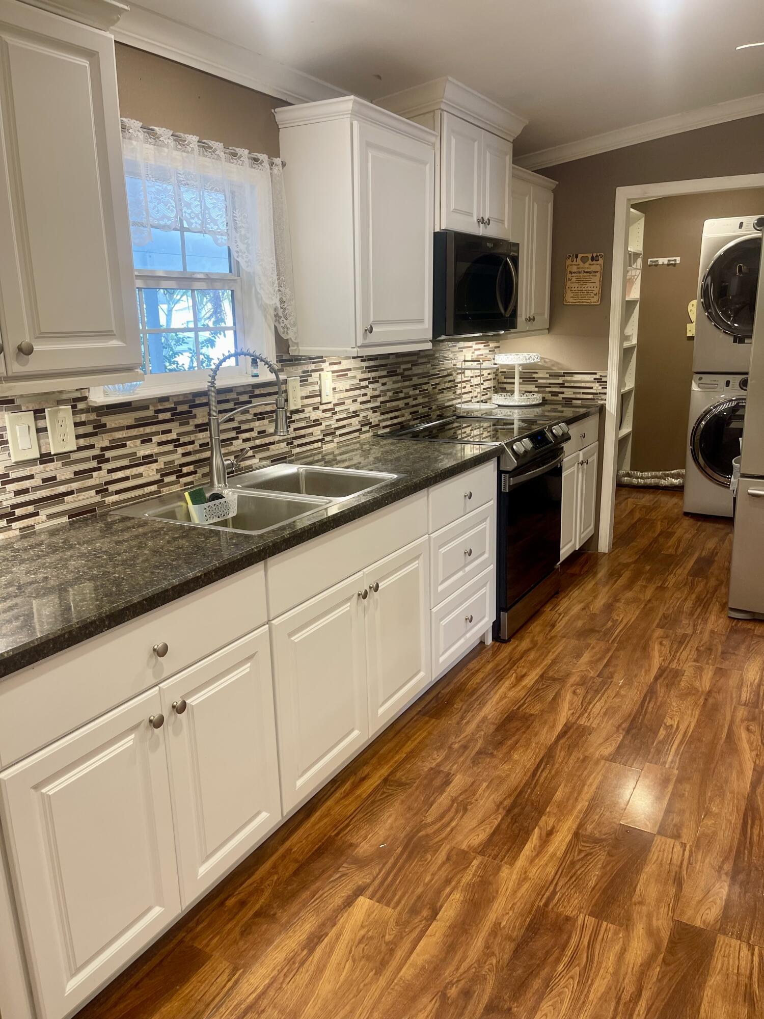 There's lots of room in this clean 4-bedroom house located in the heart of West Lake Worth. It is a great co-living opportunity. The North wing is already occupied by another tenant and the 2 bedrooms on the opposite side of the home are ready for your immediate move in. Private Entrance. Private Bathroom.  Private Screened in porch.