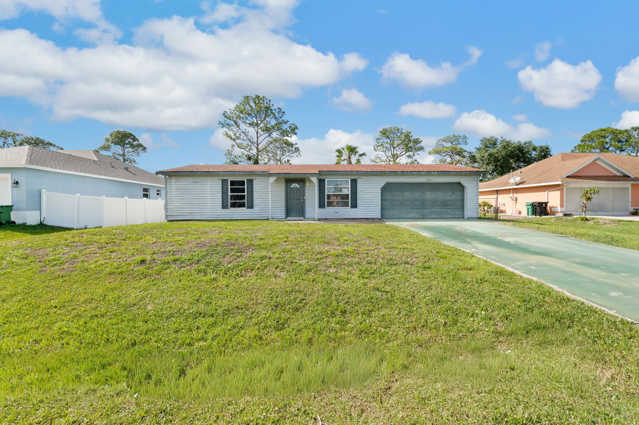 Spacious 2 bedroom, 2 bath home with fenced yard and screend porch for your enjoyment. Large family room with private entrance that could be used for in-law suite or private office or 3rd bedroom!  There is a shed for added storage. Laundry room inside. Ac new in 2019. NO HOA fee's.