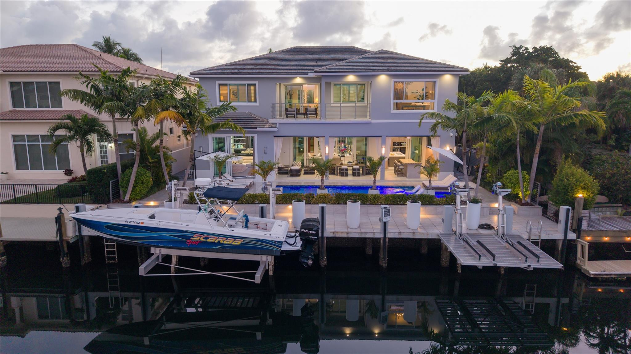 Gated, Coastal-Contemporary Deepwater Estate sited on 75' +/- of waterfrontage with wide, spell-binding views of Lake Placid on Lighthouse Point’s prestigious Intracoastal Drive. Built by renowned Zahn Builders, this exceptional like-new estate features impressive light-filled interiors from nearly every major room. Modern, chef’s kitchen with top of the line SS appliances. A 2nd level primary suite with dual walk in closets accompany four guest bedrooms all with en-suite baths. Luxe amenities include elevator, chilled wine display, upgraded Savant home automation, 12’ ceilings and more. Outdoor entertaining is enjoyed at the expansive covered loggia with roll down screens and resort-style pool with spill-over spa. 75+/- yacht dock minutes to the Hillsboro Inlet for the avid boater. DISCLAIMER: Information published or otherwise provided by the listing company and its representatives including but not limited to prices, measurements, square footages, lot sizes, calculations, statistics, and videos are deemed reliable but are not guaranteed and are subject to errors, omissions or changes without notice. All such information should be independently verified by any prospective purchaser or seller. Parties should perform their own due diligence to verify such information prior to a sale or listing. Listing company expressly disclaims any warranty or representation regarding such information. Prices published are either list price, sold price, and/or last asking price. The listing company participates in the Multiple Listing Service and IDX. The properties published as listed and sold are not necessarily exclusive to listing company and may be listed or have sold with other members of the Multiple Listing Service. Transactions where listing company represented both buyers and sellers are calculated as two sales. “No payments made until title passes” Some affiliations may not be applicable to certain geographic areas. If your property is currently listed with another broker, please disregard any solicitation for services. Information published or otherwise provided by seller, listing company or its representatives is deemed reliable but are not guaranteed and subject to errors, omissions, or changes without notice. Copyright 2026 by the listing company. All Rights Reserved.