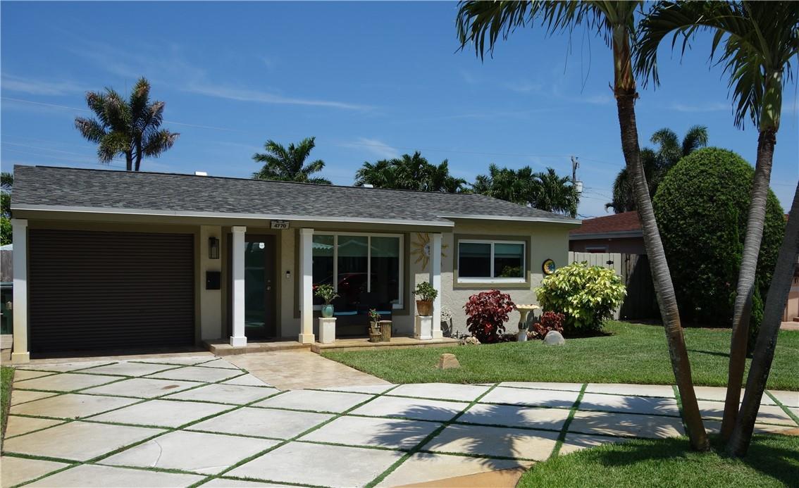 WOW! yes, WOW! This wonderful single family 3 bedroom 1 bath home is in impeccable condition. The photos do not do it justice. I will try to list all the improvements but it I'm sure I'll miss a few. ALL IMPACT WINDOS AND DOORS!, tile floors, new breaker box in and out, sprinkler system is on a well and has a ridarust system, high end blinds and shades, tankless hwh installed 2022, ceiling fans in every room, front loader washer and dryer and more. NE 3rd Terrace is a very quiet street with very little traffic. The rear yard has mango and avocado trees, tumble marble patio, two sheds, lushly landscaped but very manageable and designer driveway. Roof installed 9/2017, NEW RHEEM HVAC with ultraviolet light 6/2023, HWH 2022, impact 2016. This home comes with a whole home warranty.